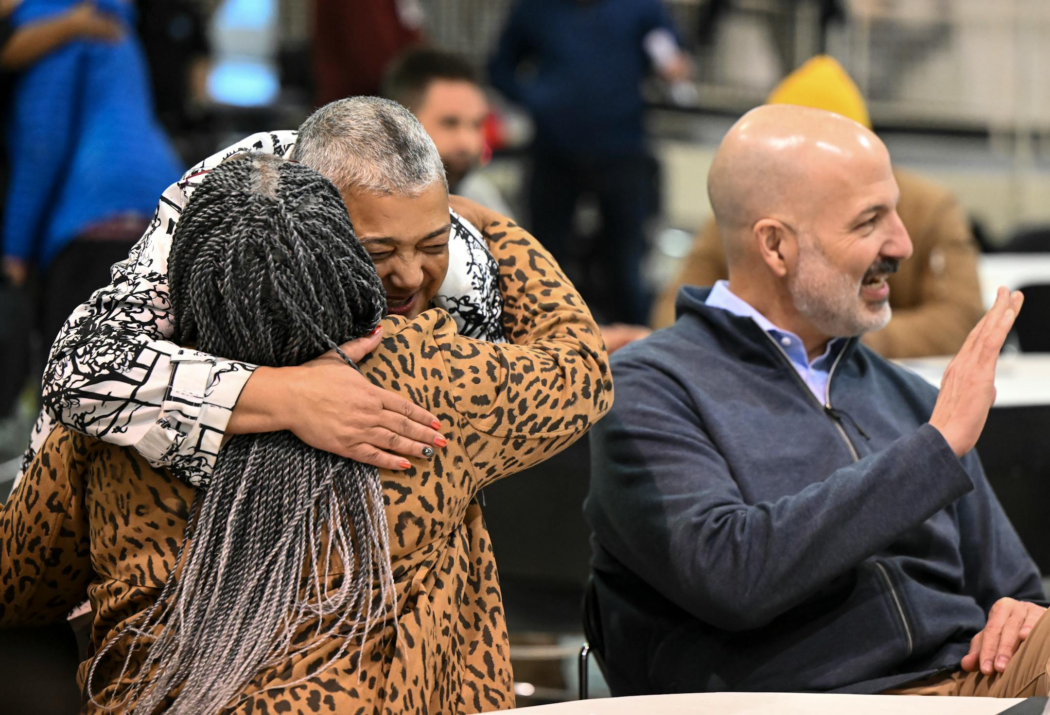 Marnita Schroedl hugs Donna Oda, of St. Paul.
