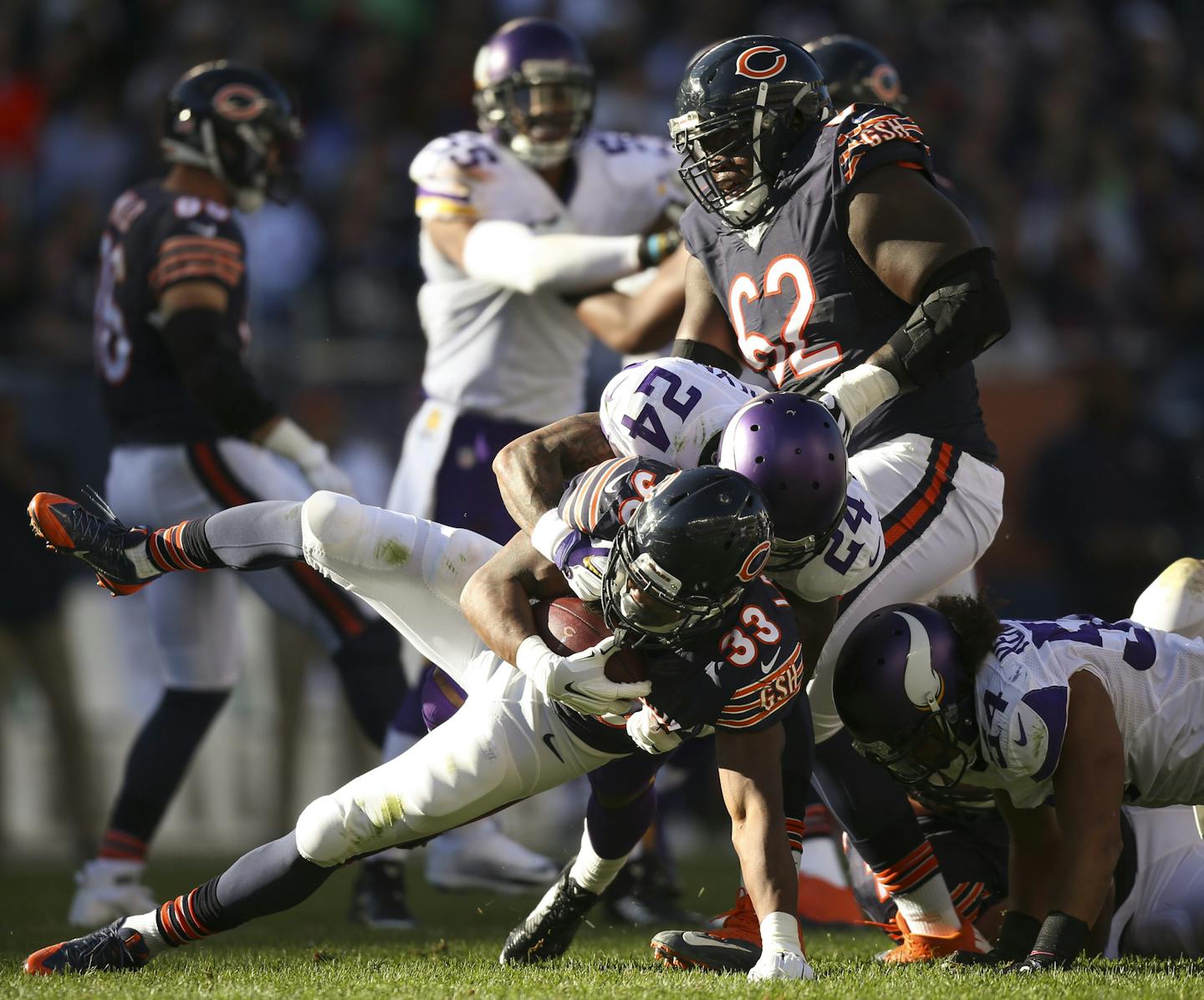 Vikings cornerback Captain Munnerlyn (24) stopped Bears running back Jeremy Langford (33) after he gained three yards in the fourth quarter Sunday afternoon. ] JEFF WHEELER &#xef; jeff.wheeler@startribune.com The Minnesota Vikings beat the Chicago Bears 23-20 on a last second field goal Sunday afternoon, November 1, 2015 at Soldier Field in Chicago. ORG XMIT: MIN1511011546230376