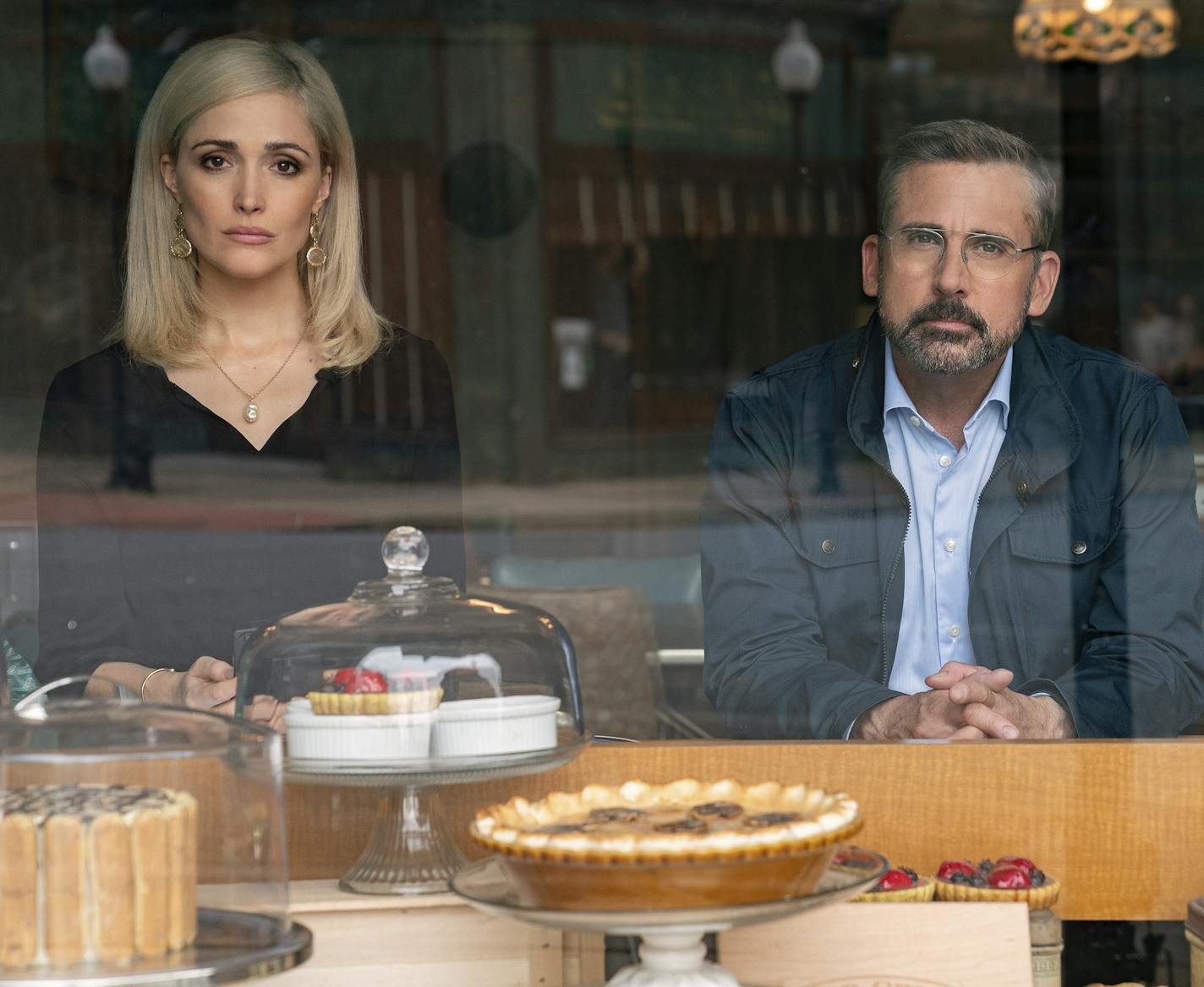 In this image released by Focus Features, Steve Carell, right, and Rose Byrne appear in a scene from "Irresistible." (Daniel McFadden/Focus Features via AP)