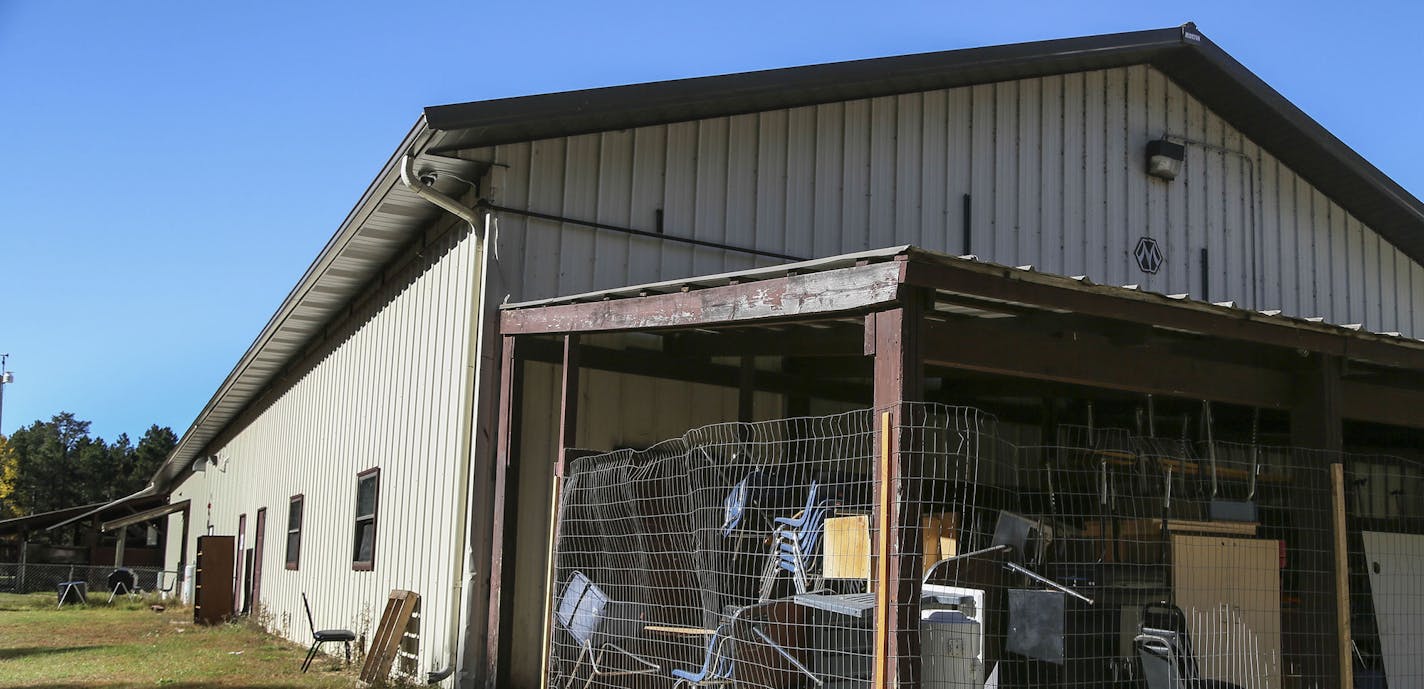 Bug-O-Nay-Ge-Shig High School was once a pole shed for vehicle maintenance and turned into a high school and is lacking much, including storage space. These chairs and desks were seen in an exterior storage space Tuesday, Oct. 21, 2014, in Bena, MN.](DAVID JOLES/STARTRIBUNE)djoles@startribune The Bug O Nay Ge Shig School is a culturally based alternative school that opened in 1975 with a mission of serving Ojibwe children and has matured into a fully accredited educational program. Bug School is