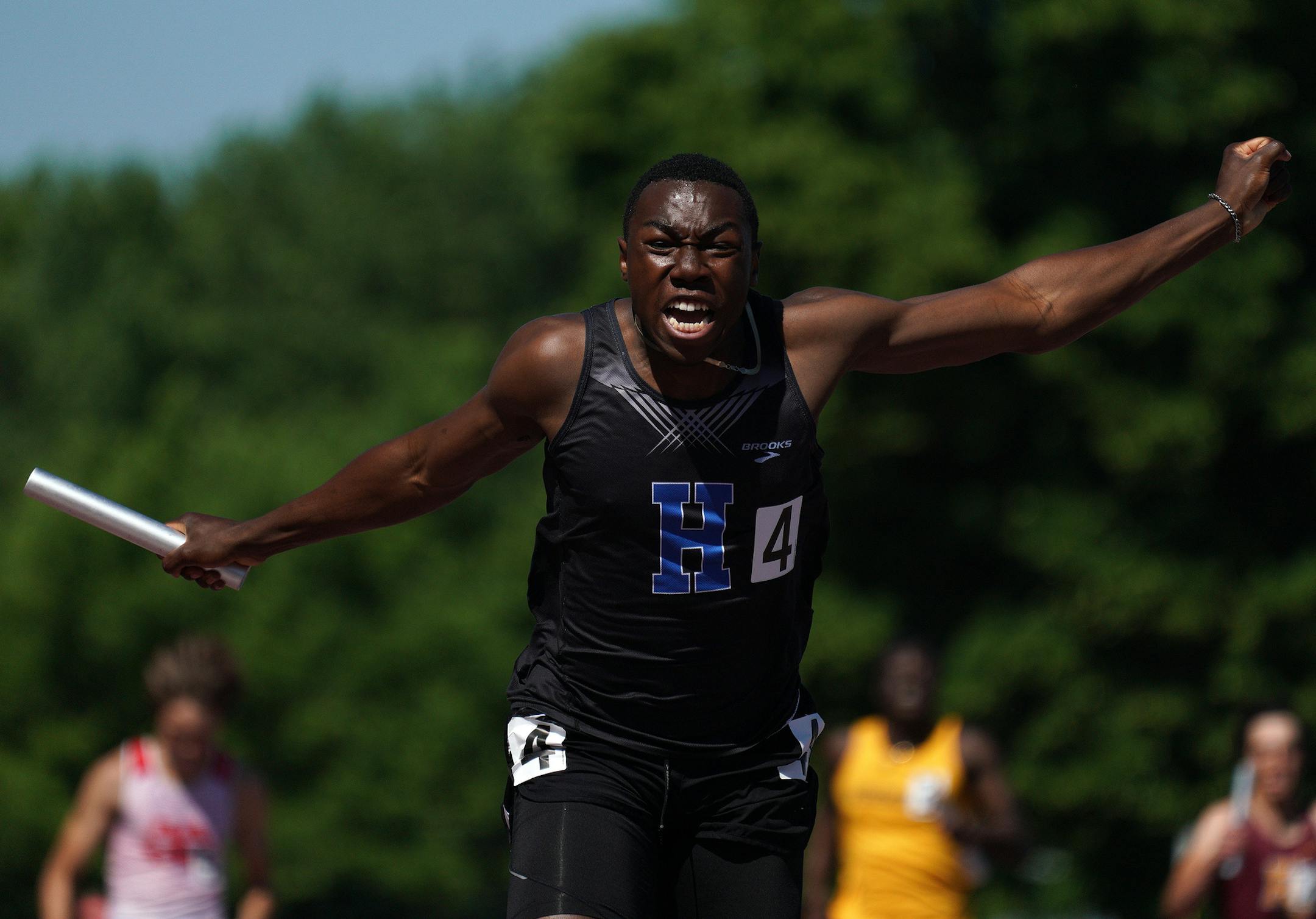 Joe Fahnbulleh of Hopkins High School ran the last leg of the boys 4 x 200 meter relay to win it for Hopkins with a time of 1:25.58. ] ANTHONY SOUFFLE • anthony.souffle@startribune.com Student athletes competed in the MSHSL Class 2A track and field meet finals Saturday, June 8, 2019 at Hamline University in St. Paul, Minn.