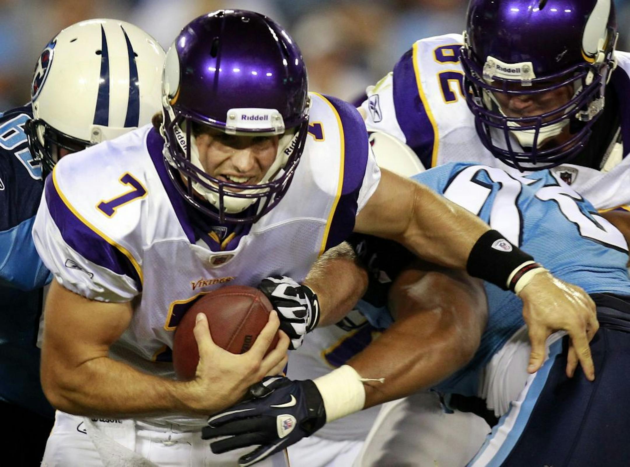 Vikings quarterback Christian Ponder (7) was sacked by Zack Clayton (69) in the third quarter.