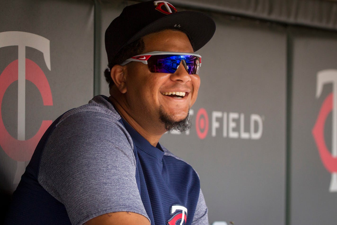 Minnesota Twins Adalberto Mejia smiles in the dugout during a baseball game with the Kansas City Royals Sunday, Aug. 5, 2018, in Minneapolis. (AP Photo/Bruce Kluckhohn)