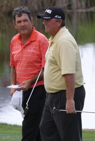 (left to right) David Frost and Mark Calcavecchia walked off the 9th hole, both tied for 2nd at 8 under par, during the 3M Championship in Blaine.