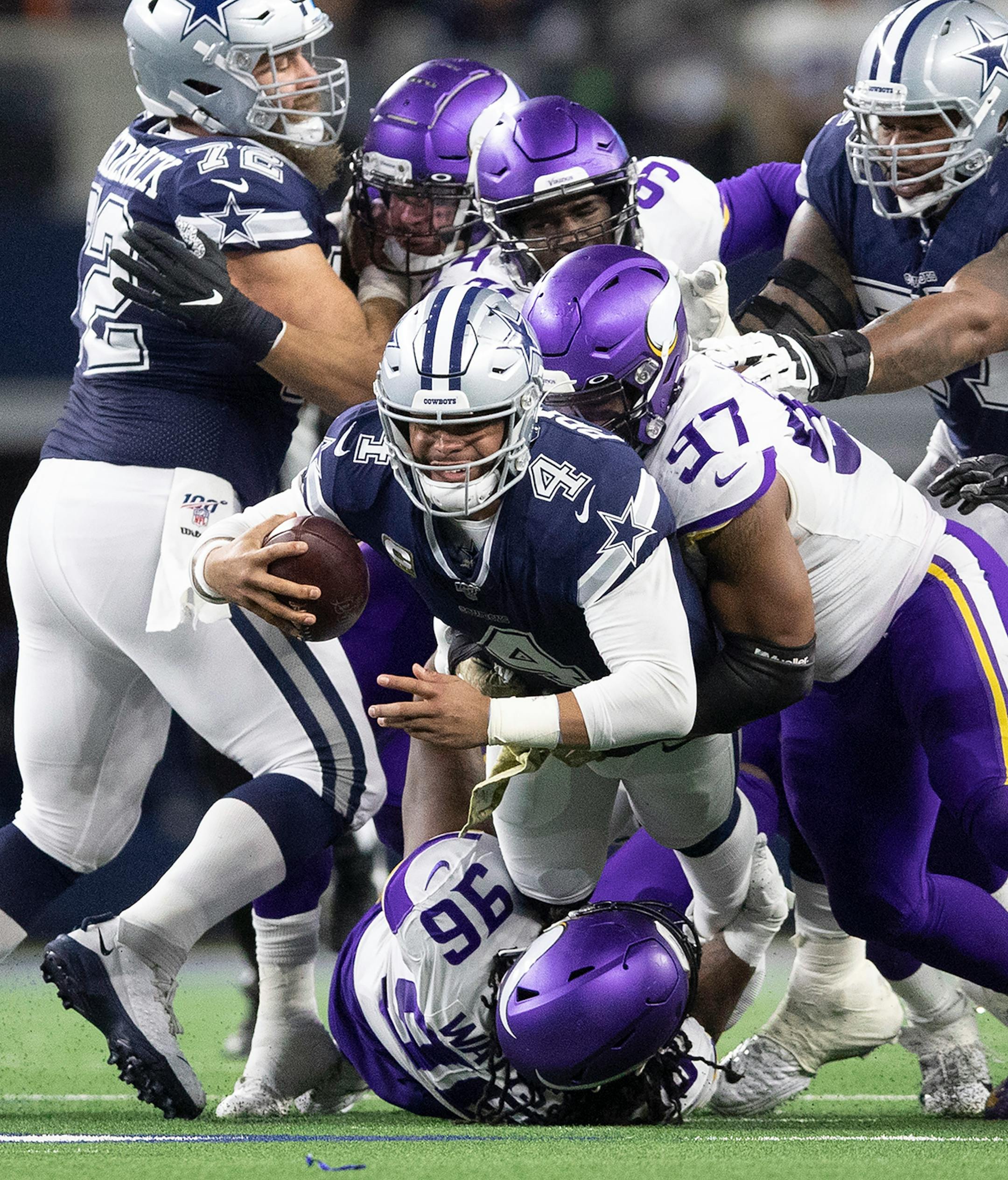ARLINGTON, TX - NOVEMBER 10: Minnesota Vikings defensive end Everson Griffen (97) sacked Dallas Cowboys quarterback Dak Prescott (4) in the second quarter during an NFL football game on Sunday, November 10, 2019 at AT&T Stadium in Arlington, Texas. (Photo by Jerry Holt/Star Tribune via Getty Images)