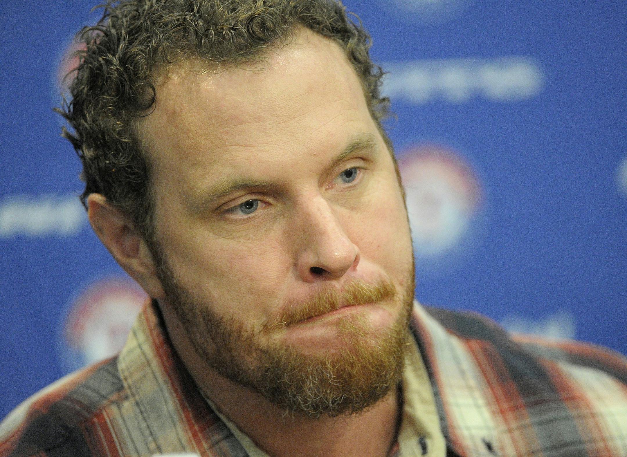 Outfielder Josh Hamilton listens intently during a press conference at Globe Life Park in Arlington, Texas, Monday, April 27, 2015, announcing that the club has acquired the outfielder from the Los Angeles Angels. Hamilton returns to the team he helped reach consecutive World Series appearances in 2010 and '11. (Max Faulkner/The Fort Worth Star-Telegram via AP) MAGS OUT; (FORT WORTH WEEKLY, 360 WEST) MANDATORY CREDIT