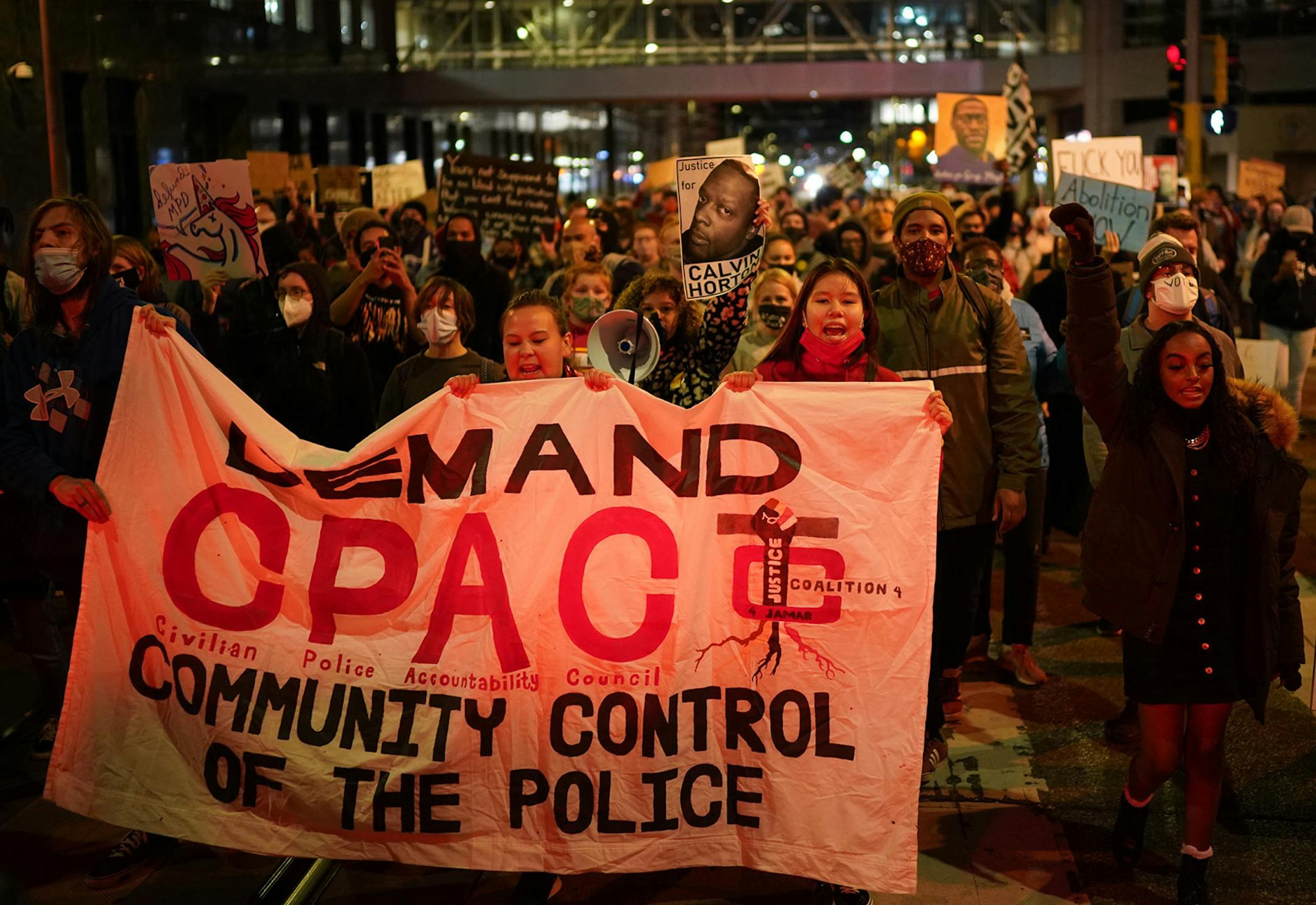 demonstrators marched on downtown streets after leaving Hennepin County Government Center.