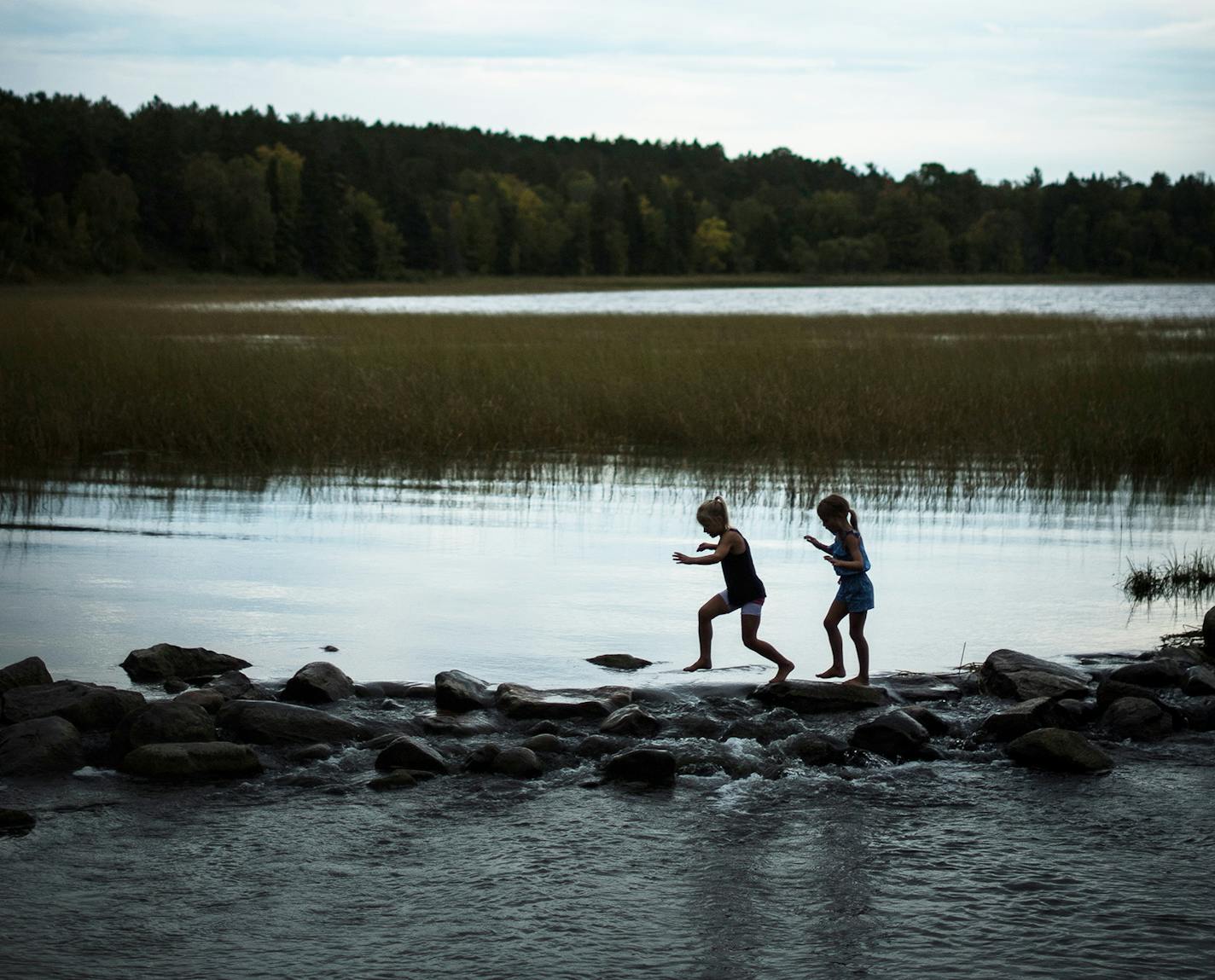 Lidia Ravaska, 8, left, and her sister Gabriella, 7, of Dassel Cokato, played on the rocks at the Mississippi Headwaters in Itasca State Park on Sunday, Sept. 18 2016. ] (AARON LAVINSKY/STAR TRIBUNE)&nbsp;aaron.lavinsky@startribune.com