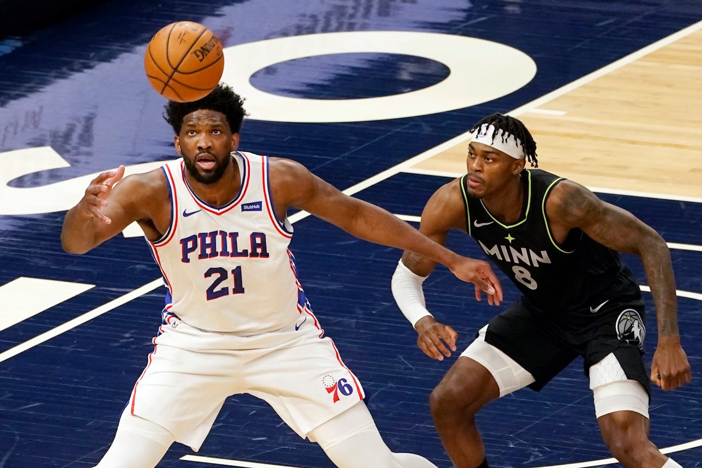 Philadelphia 76ers' Joel Embiid waits for a pass as the Timberwolves' Jarred Vanderbilt defends during the first half