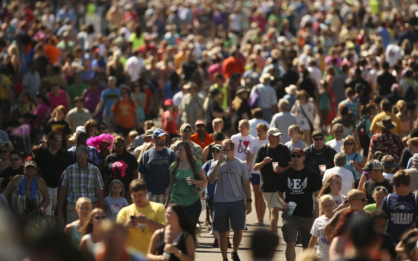 The Minnesota State Fair opened Thursday, August 22, 2013 on a perfect day, weather-wise. Opening day fairgoers clogged Judson Ave. Thursday afternoon. ] JEFF WHEELER &#x201a;&#xc4;&#xa2; jeff.wheeler@startribune.com ORG XMIT: MIN1308221600355664