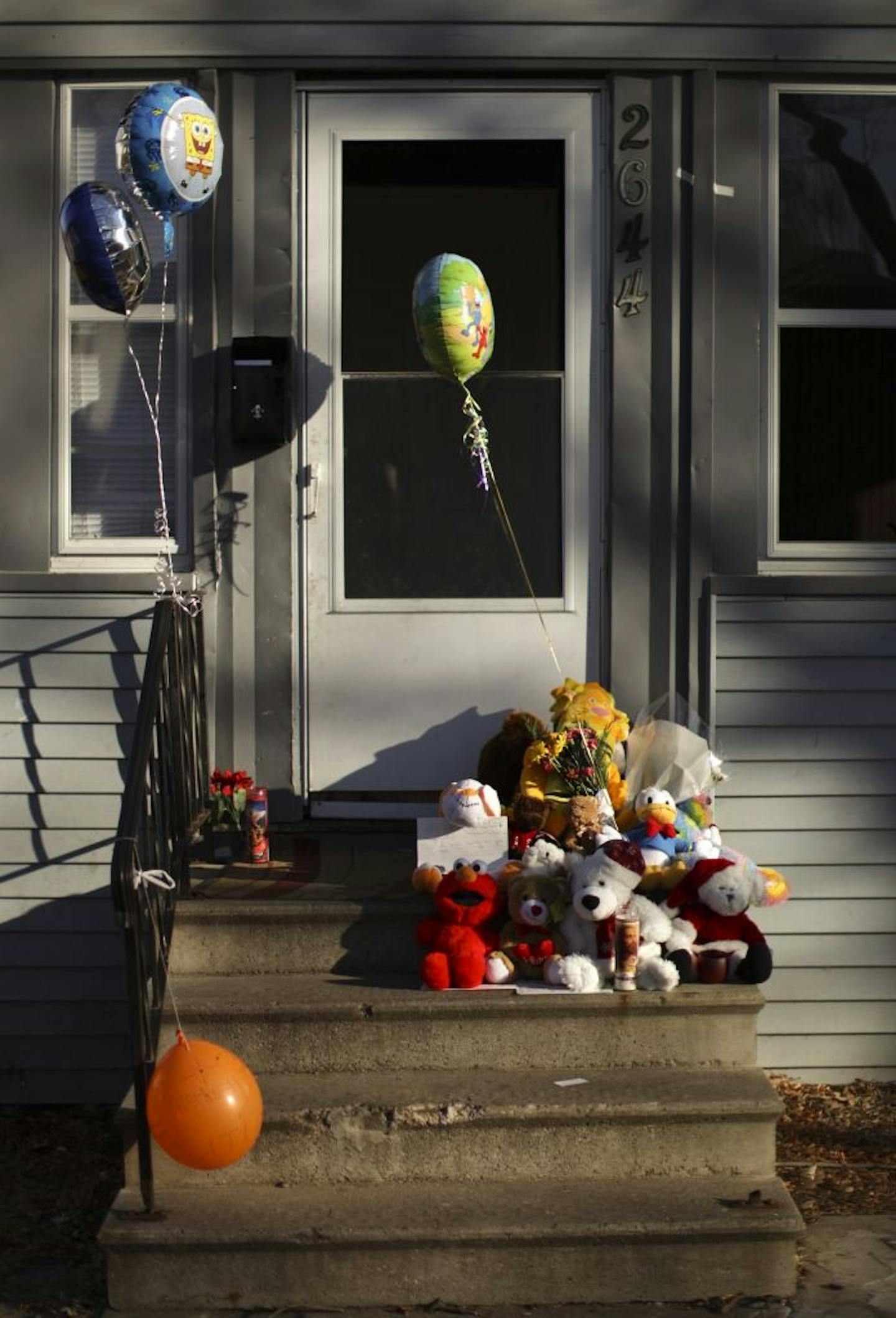 A memorial for Terrell Mayes, the 3-year-old killed by a bullet, was assembled on the steps of his home.