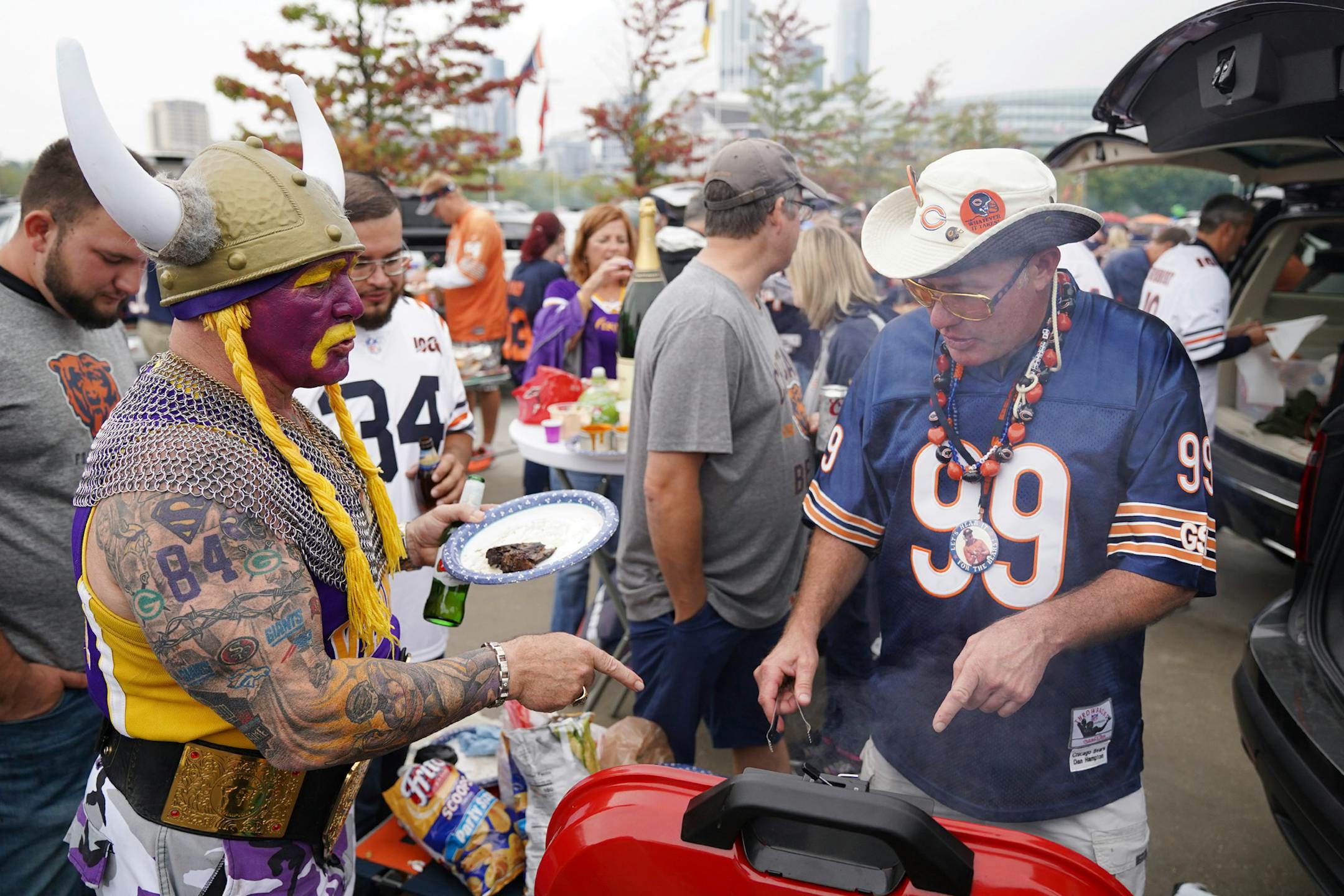 Minnesota Vikings superfan Syd Davy of Vancouver, British Columbia talked with Bears Rick Webber of Plainfield, Ill. as he grilled while tailgating at the Waldron Parking Deck prior to Sunday's game between the Minnesota Vikings and the Chicago Bears at Soldier Field. ] ANTHONY SOUFFLE • anthony.souffle@startribune.com The Minnesota Vikings played the Chicago Bears in an NFL football game Sunday, Sept. 29, 2019 at Soldier Field in Chicago.