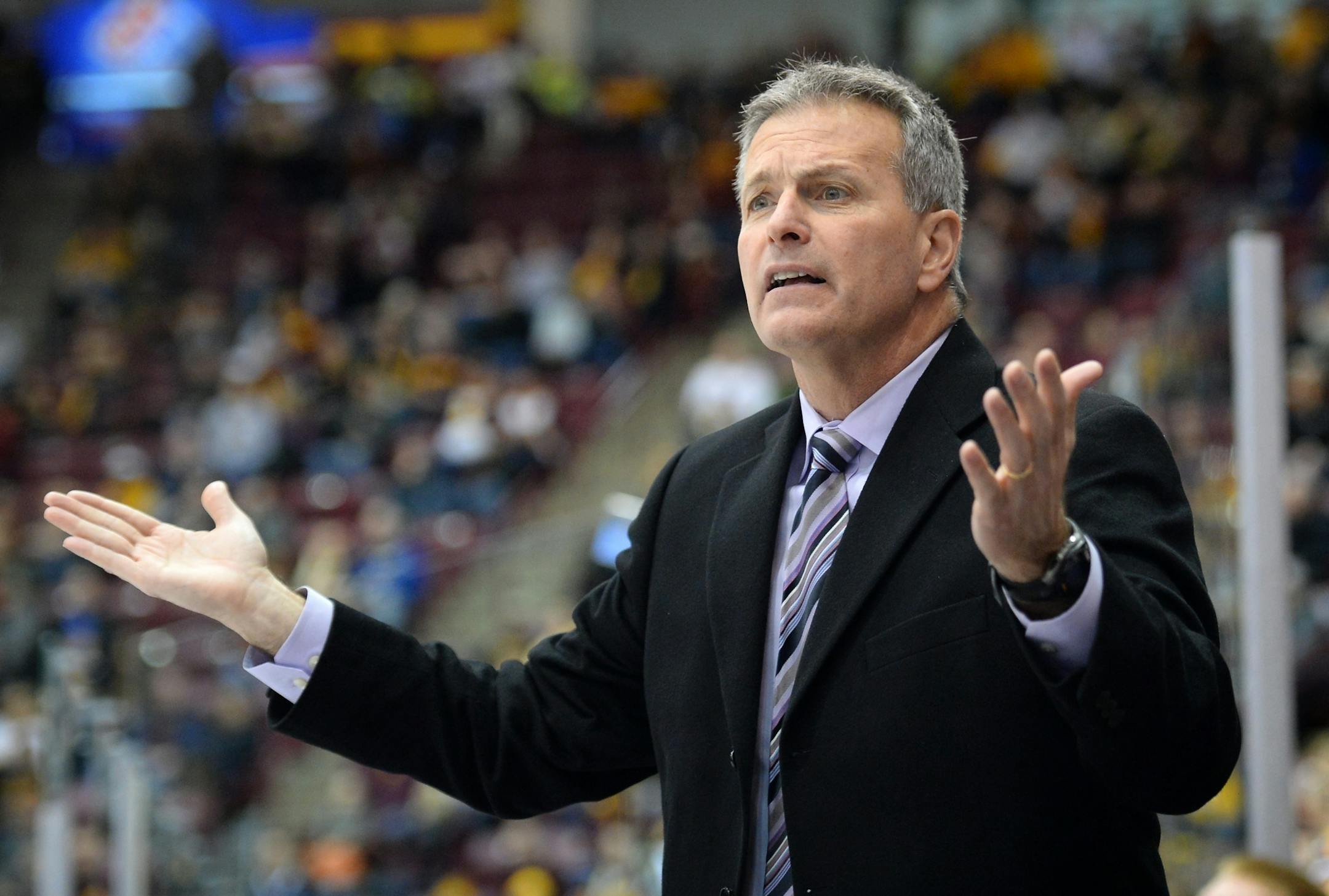 Minnesota Golden Gophers head coach Don Lucia argued with an official during the third period against the Penn State Nittany Lions Friday night.