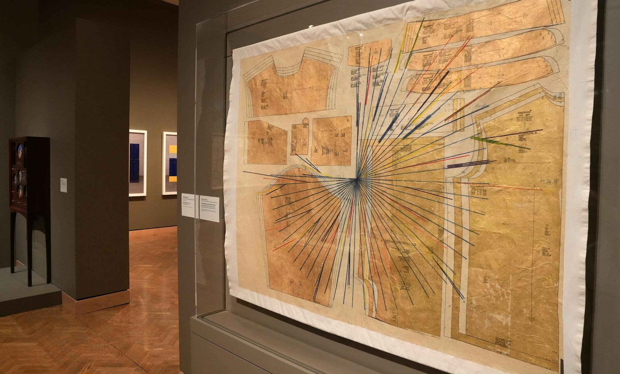 A wall inscription near Los Desaparecidos (the arbiter of time) by Ronny Quevedo reads: "the Inca used khipus, a system of knotted, color-coded cords, as a record of the movement of goods and people across their vast empire" in the new ReVisión: Art in the Americas exhibit during a press preview Thursday, June 29, 2023 at the Minneapolis Institute of Art in Minneapolis. ] ANTHONY SOUFFLE • anthony.souffle@startribune.com