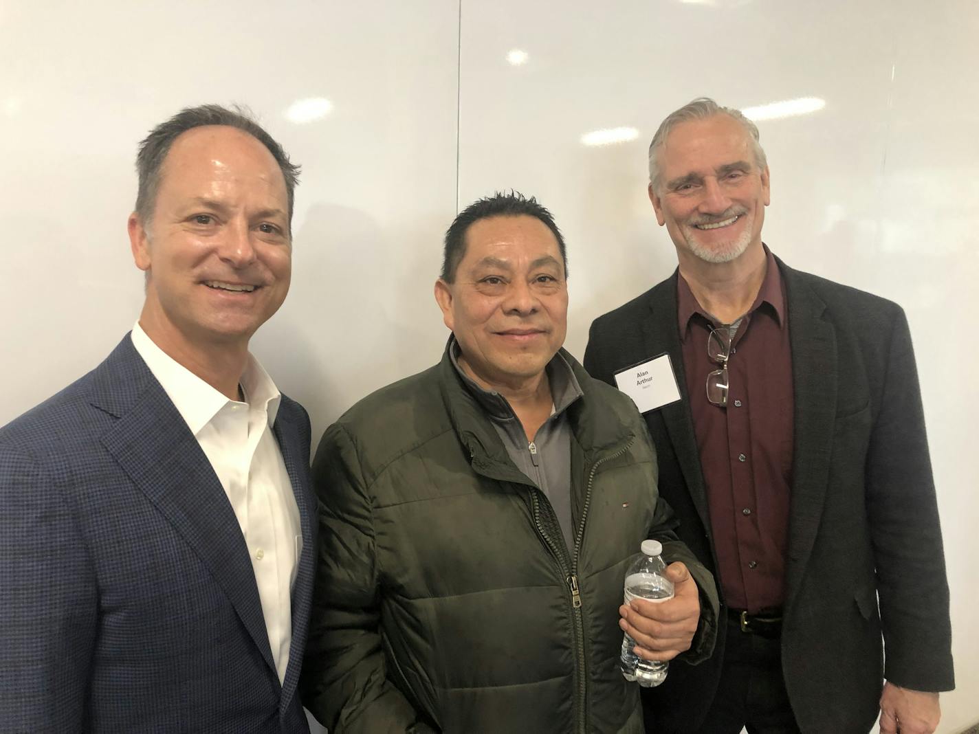 Sunrise Banks CEO Dave Reiling, Aeon worker-resident Santos Mejas and Aeon CEO Alan Arthur.
Photo: Neal.St.Anthony@startribune.com