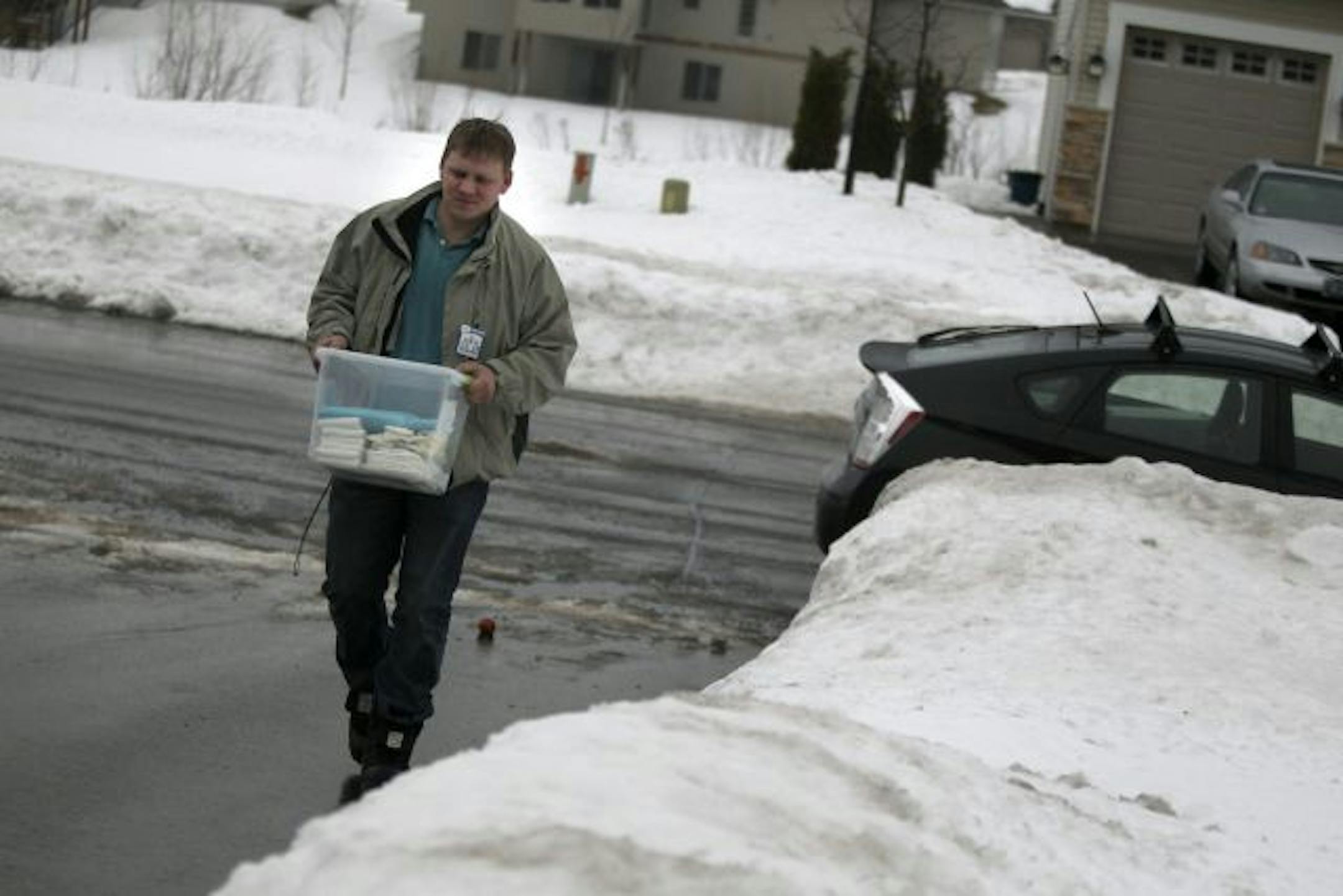 Martin Cross uses a gas-saving Prius to deliver diapers to 40 customers on a wide-ranging route.