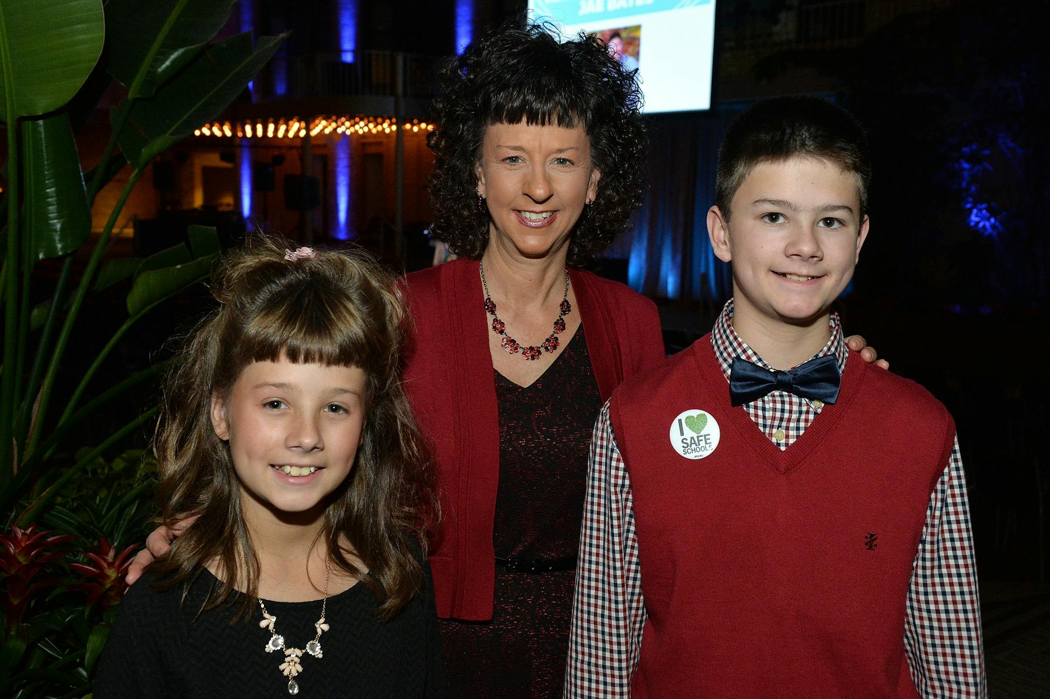 From left, Lydia Ross, Melanie Ross and Courage Award winner, Jake Ross.