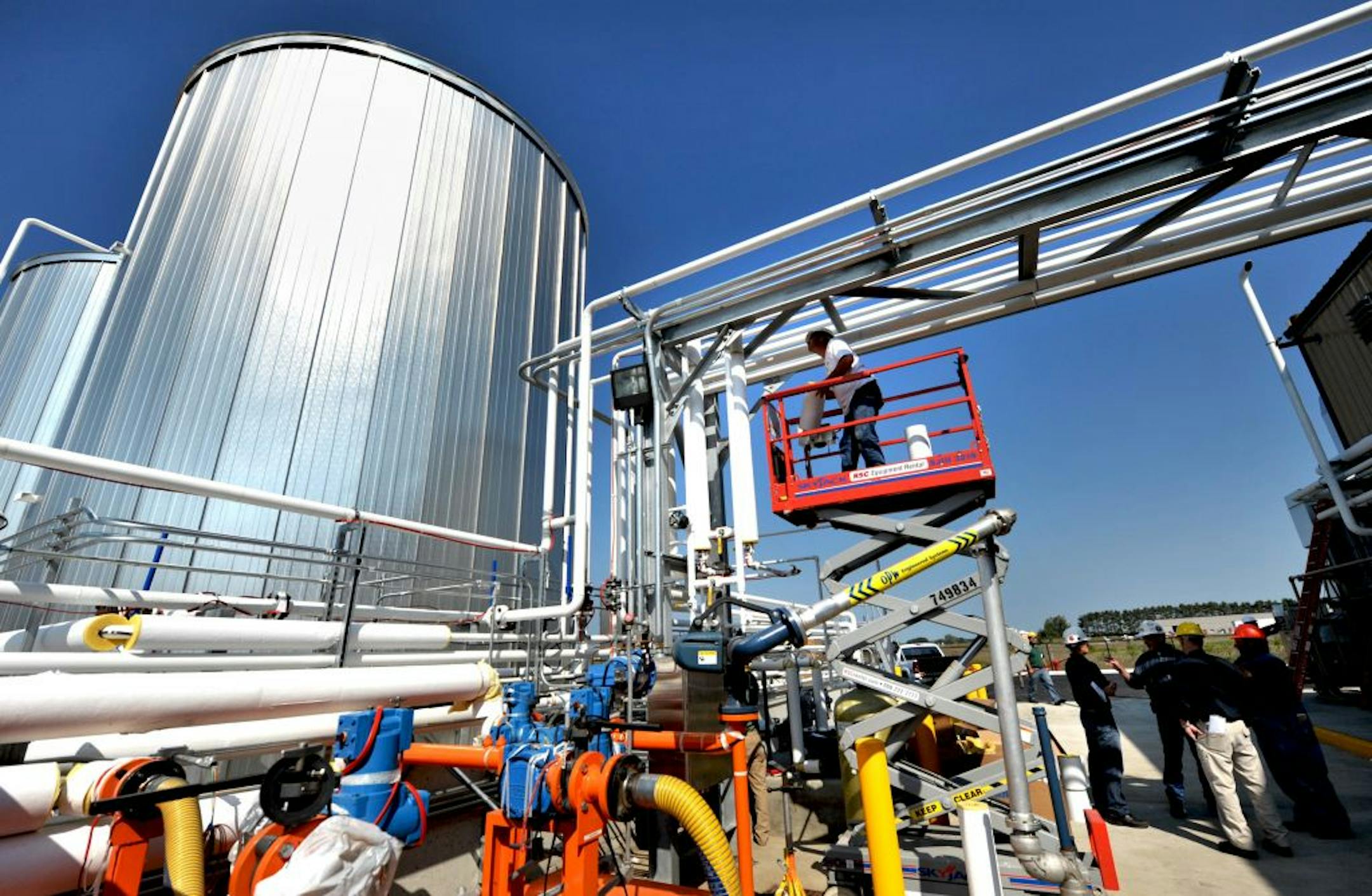 Workers at the biodiesel plant Ever Cat Fuels in Isanti, Minn., as it neared completion in 2009. The plant processes waste cooking oil.