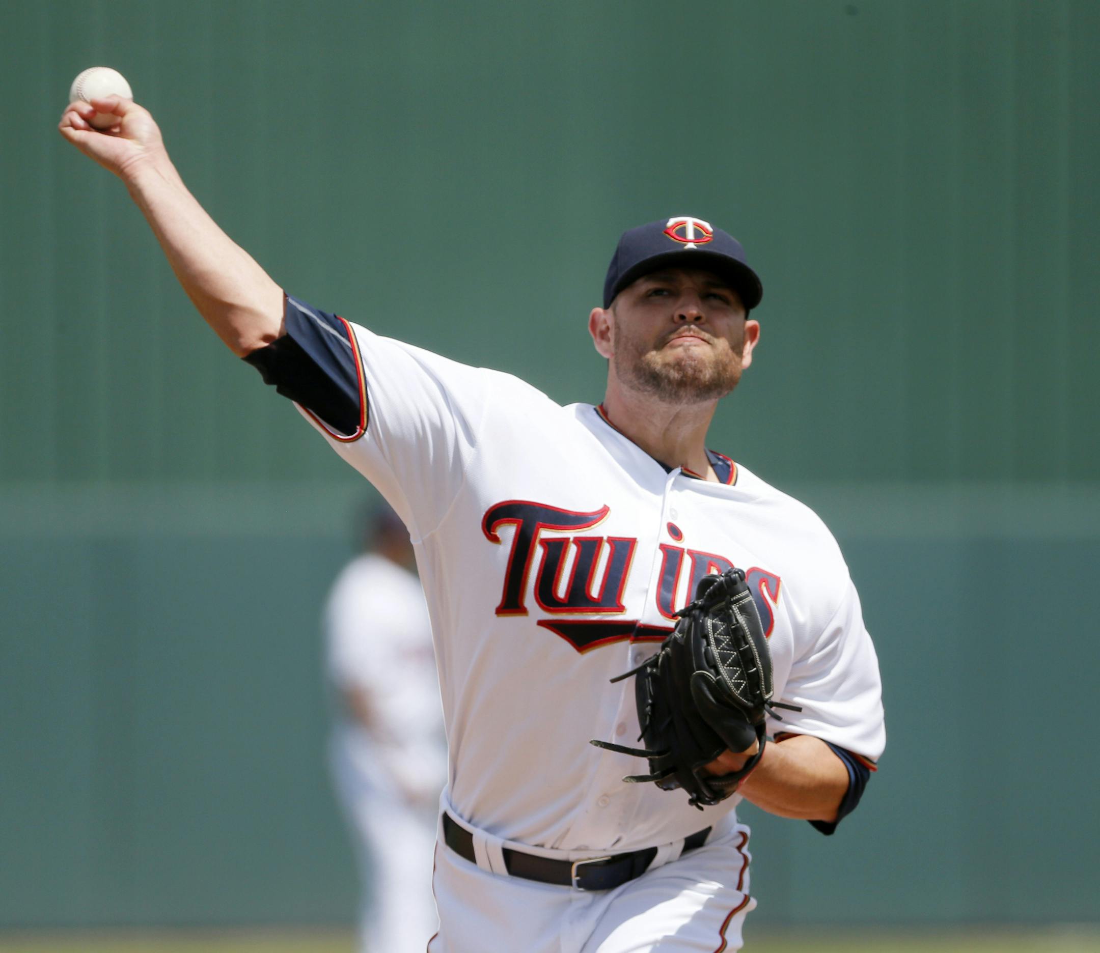 Minnesota Twins starting pitcher Ricky Nolasco throws a warm up pitch in the fist inning of a spring training baseball game, Wednesday, March 23, 2016, in Fort Myers, Fla. (AP Photo/Tony Gutierrez)