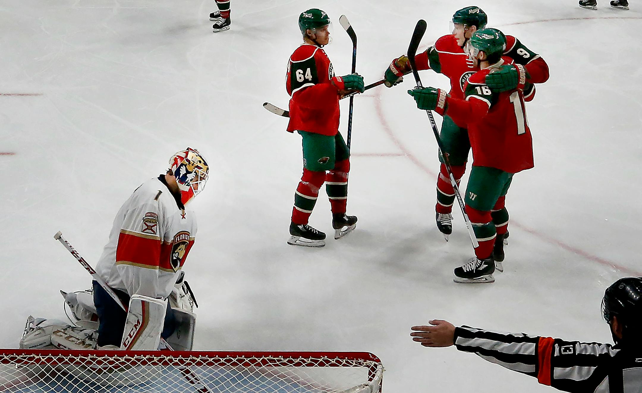 Mikko Koivu (9) celebrated with Jason Zucker (16) and Mikael Granlund (64) after scoring a goal against the Florida Panthers in December. ] CARLOS GONZALEZ cgonzalez@startribune.com - December 13, 2016, St. Paul, Minnesota, NHL Hockey, Xcel Energy Center, Minnesota Wild vs. Florida Panthers
