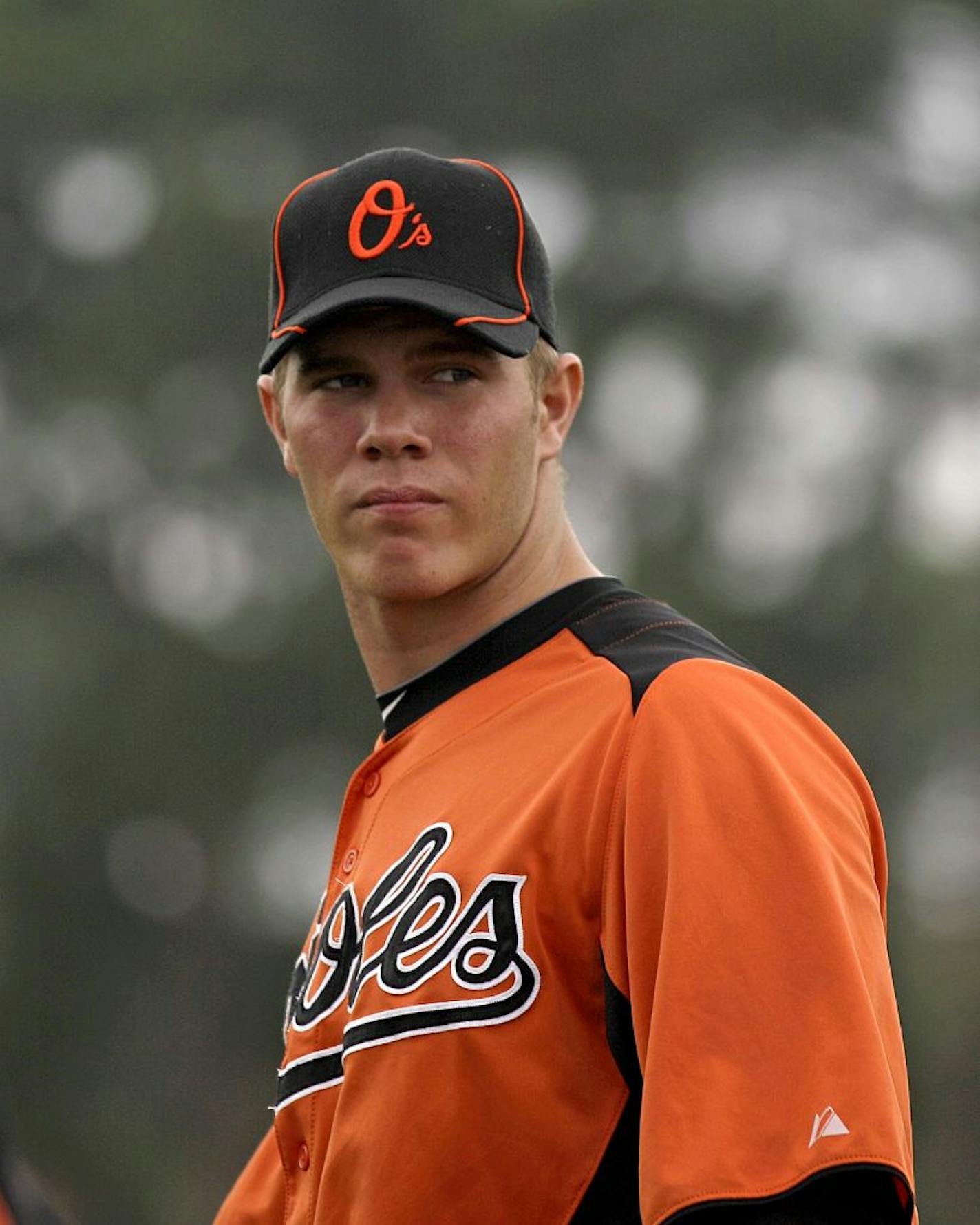 Baltimore Orioles pitcher Dylan Bundy walks on the field during a baseball spring training workout Thursday, Feb. 23, 2012, in Sarasota, Fla.