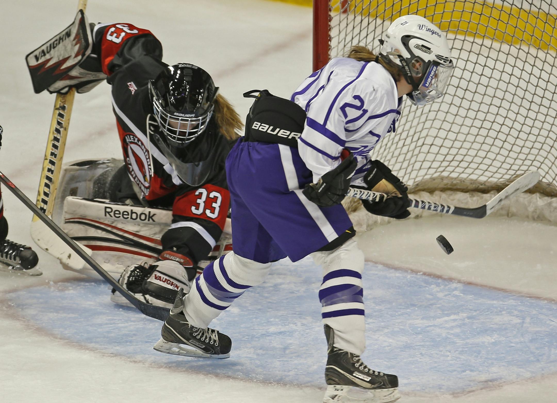 Alexandria goalie Amy Jost couldn't stop Red Wing's Nicole Schammel from scoring in first period action.