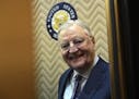 Former Vice President Walter Mondale smiles as he gets on an elevator on Capitol Hill in Washington, Wednesday, Jan. 3, 2018. Mondale was in Washingto