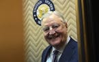 Former Vice President Walter Mondale smiles as he gets on an elevator on Capitol Hill in Washington, Wednesday, Jan. 3, 2018. Mondale was in Washingto