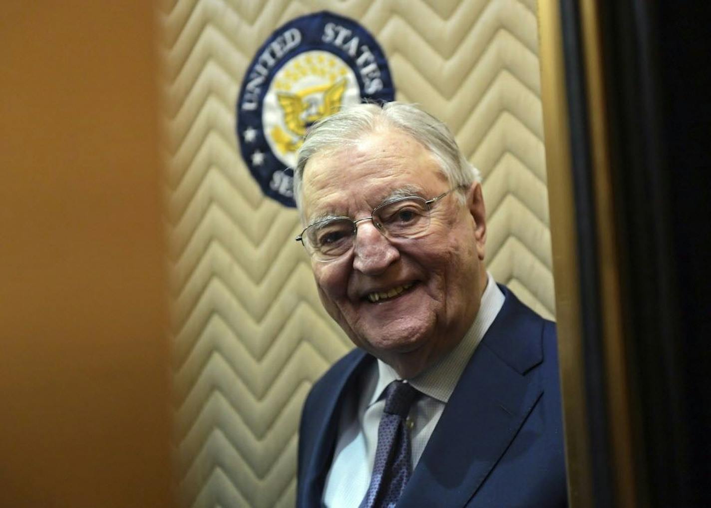 Former Vice President Walter Mondale smiles as he gets on an elevator on Capitol Hill in Washington, Wednesday, Jan. 3, 2018. Mondale was in Washington to attend the swearing in of Sen. Tina Smith, D-Minn. The Republican majority in the Senate narrowed to 51-49 on Wednesday as two new Democratic senators were sworn into office, complicating GOP efforts to advance the party's legislative agenda before the 2018 midterm elections.