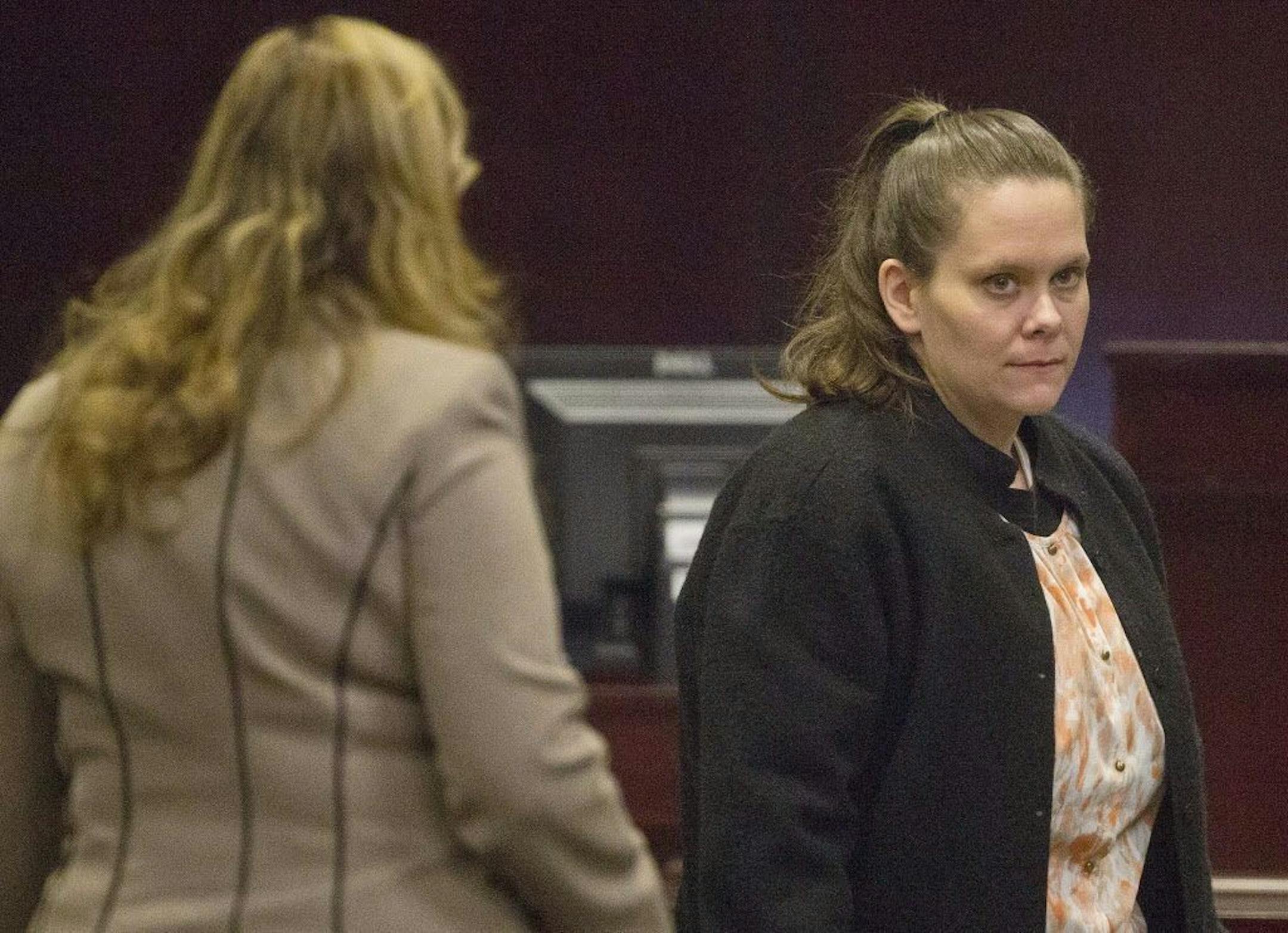 Wendy Wood Holland, 35, appears in the Baldwin County Circuit Court Wednesday, Dec. 10, 2014, in Bay Minette, Ala.