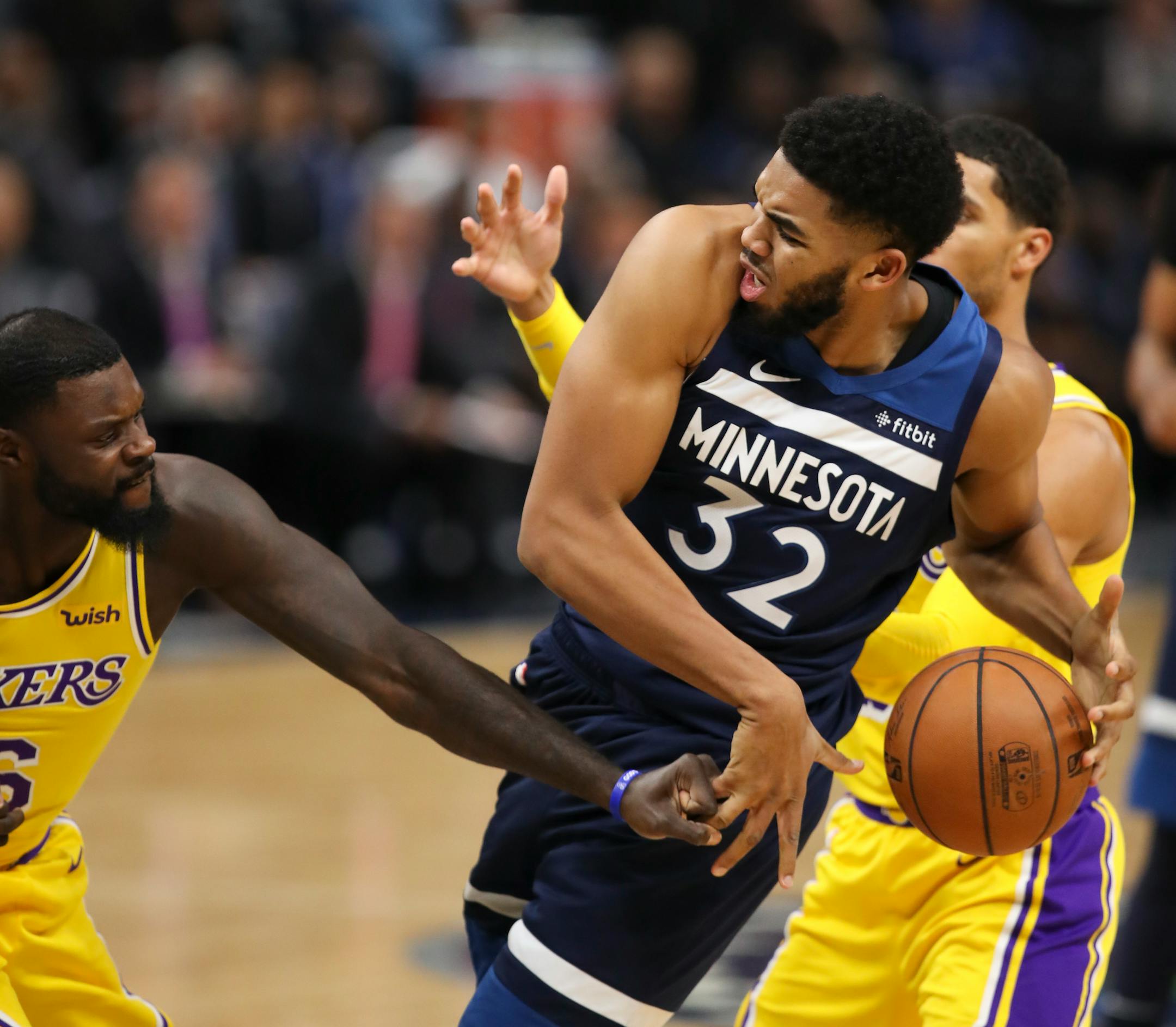 Timberwolves center Karl-Anthony Towns fended off Lakers guard Lance Stephenson for a rebound in a late October game at Target Center.