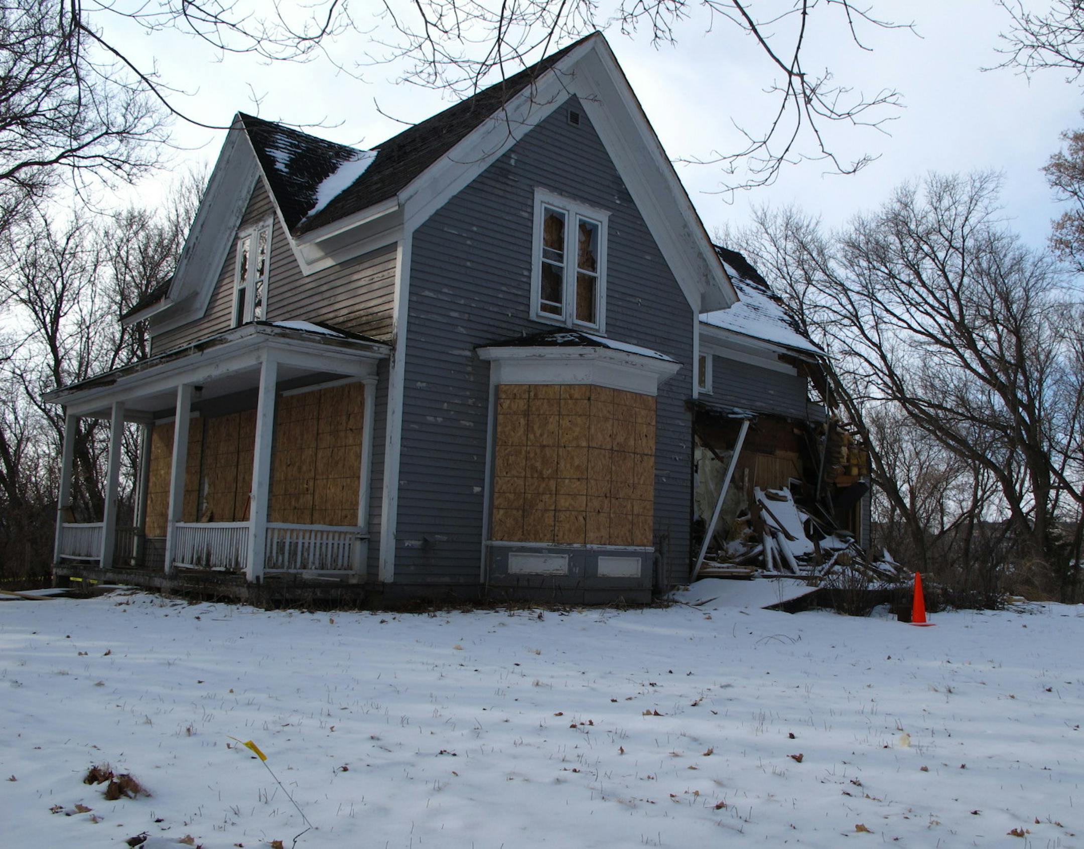 The Boutwell House, shown last week, was partially demolished from the back. Chimneys were removed years ago but the house otherwise closely resembles its early version.