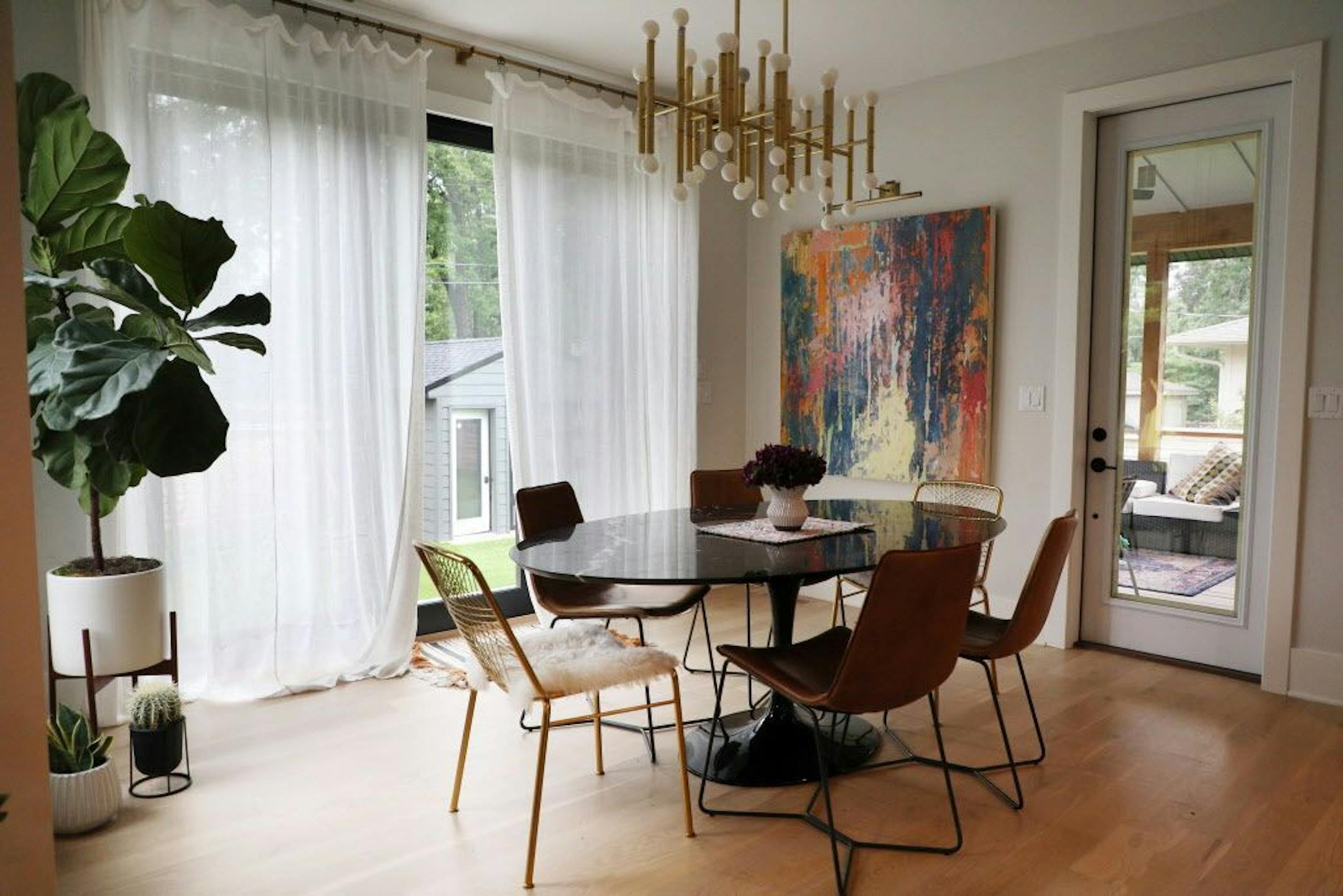 The dining room overlooks the backyard.