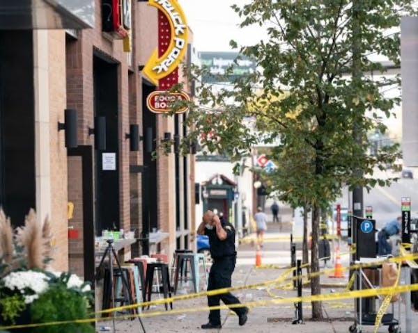 Investigators worked at the scene of a multiple shooting that occurred in October at the 7th Street Truck Park bar in St. Paul.
