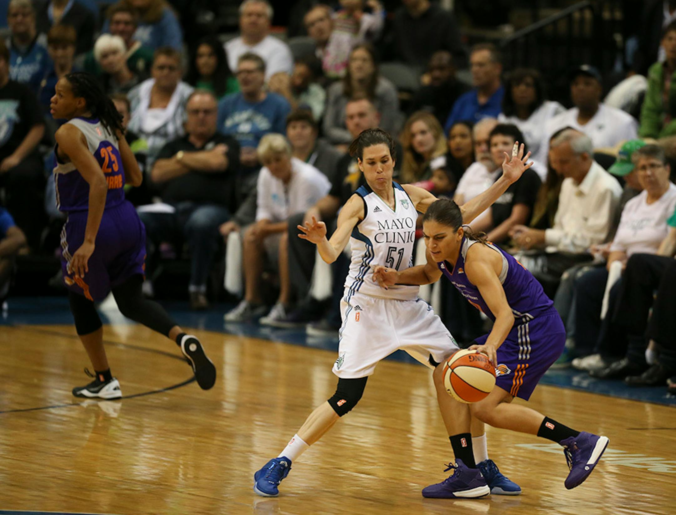 Lynx guard Anna Cruz (51) defended Phoenix Mercury guard Marta Xargay Casademont as she moved the ball up court in the second half Thursday night at Target Center.