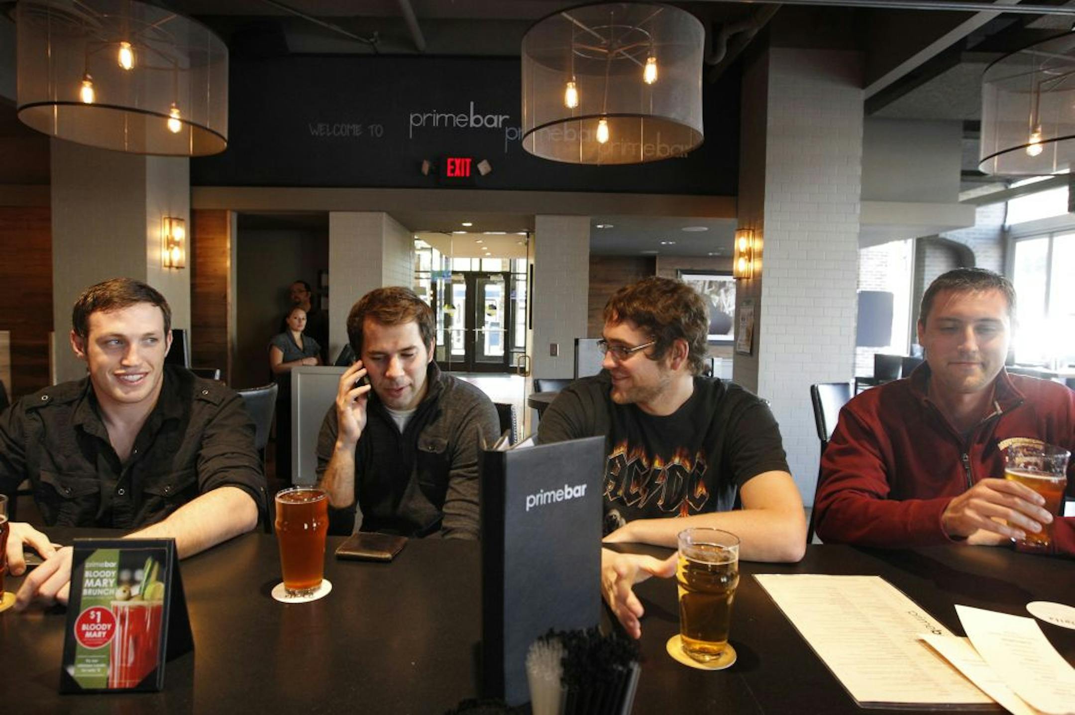 Primebar guests, from left, are Kent Scheff, Steve Skube, Marcel Rivard, and J.J. Germscheid all of minneapolis. _ Restaurant review of Primebar. Lots of choices of Great locally brewed beers on the taps. The food: Deviled eggs, Pulled Pork sliders, Duck Confit tacos, Cobb salad and Inside out Ravioli. [ TOM WALLACE � twallace@startribune.com _ Assignments #20025555A _ Sept 27, 2012_ SLUG: rn1004_ EXTRA INFORMATION: Bartender Michael Long, guest from left to right are Kent Scheff, Steve Skube, M