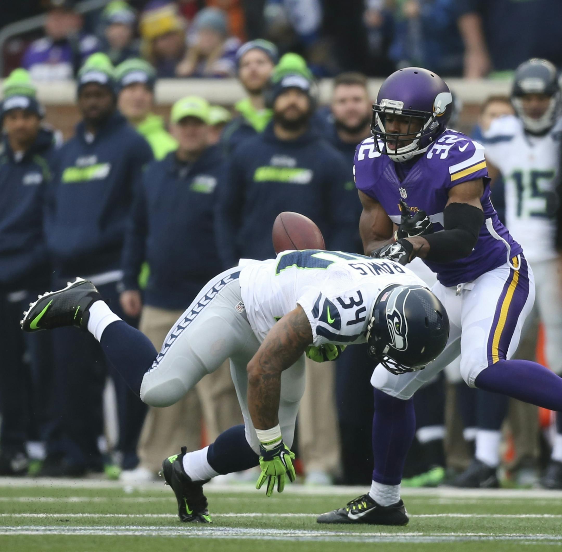 Seahawks running back Thomas Rawls (34) fumbled the ball on a fun early in the first quarter when hit by Vikings cornerback Antone Exum (32). Exum recovered the ball but the Vikings went three and out.