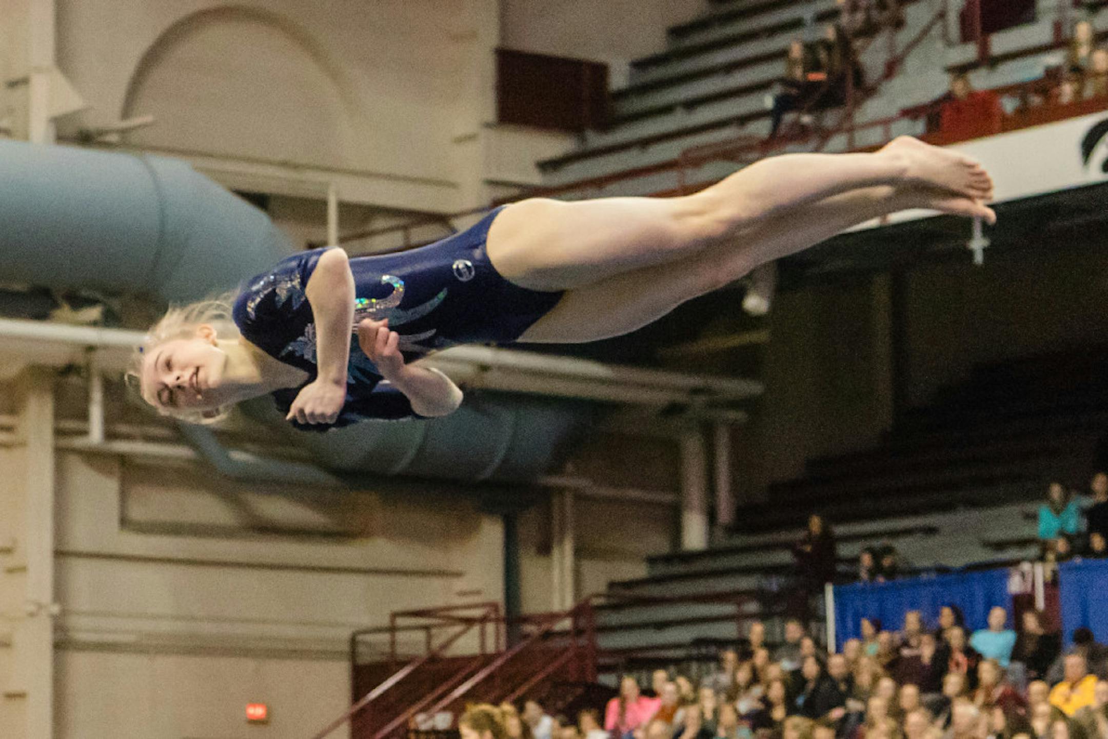 Champlin Park's Chaney Neu during the floor exercise at the Class 2A gymnastics state meet Feb. 25 at the University of Minnesota Sports Pavilion. The eighth-grader placed first in the all-around, becoming the youngest to do so in meet history.