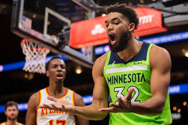 Timberwolves center Karl-Anthony Towns (32) reacted to foul by Hawks forward Onyeka Okongwu (17) during the second half Wednesday.