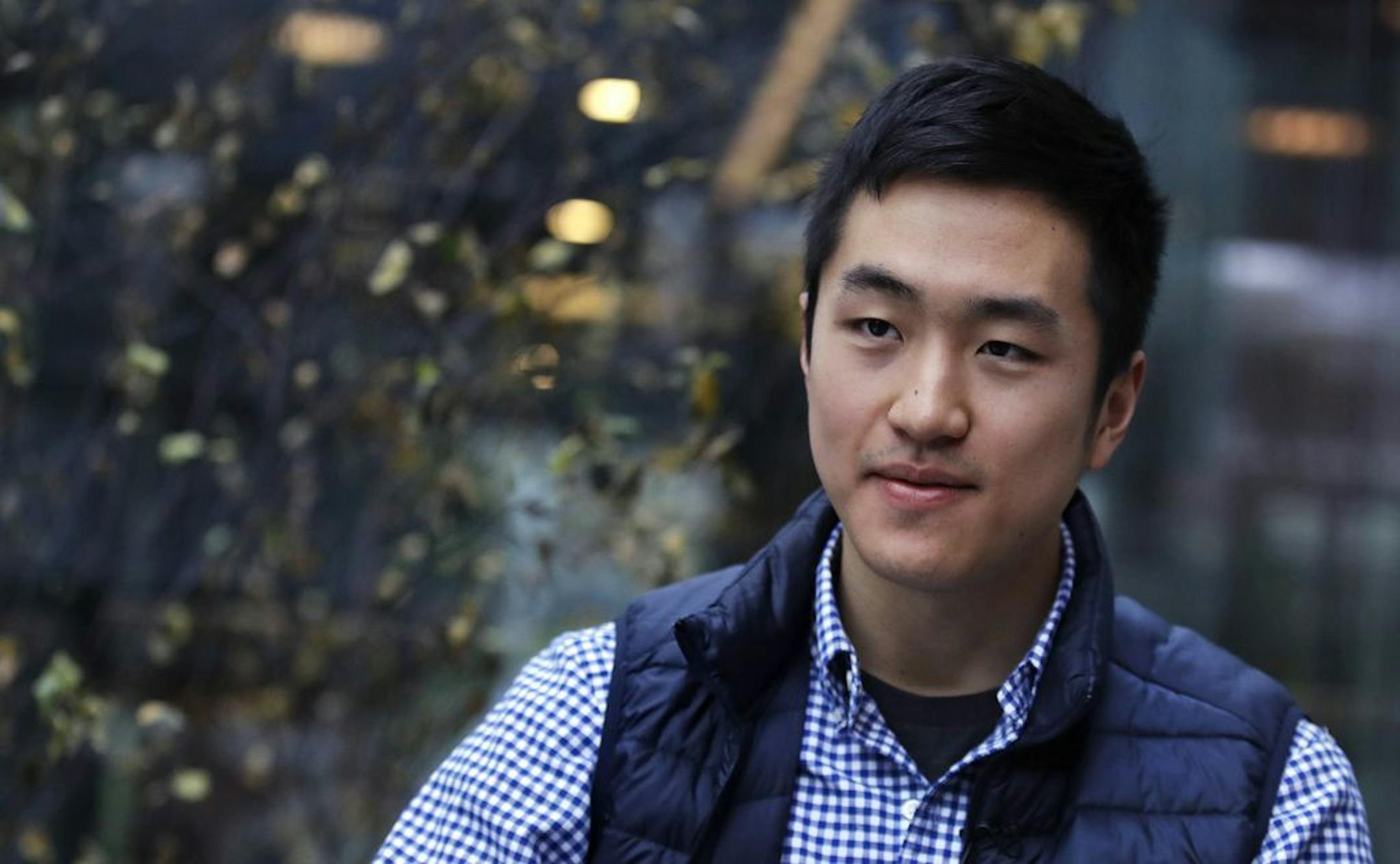 Harvard University graduate Jin K. Park, who holds a degree in molecular and cellular biology, listens during an interview in Cambridge, Mass., Thursday, Dec. 13, 2018. Park, who was named a Rhodes Scholar along with 30 other Americans in November, entered the U.S. illegally as a child, moving to Queens borough of New York City with his family. The undocumented student, who participates in the Deferred Action for Childhood Arrivals program (DACA), is not sure if he'll be allowed back in the U.S.