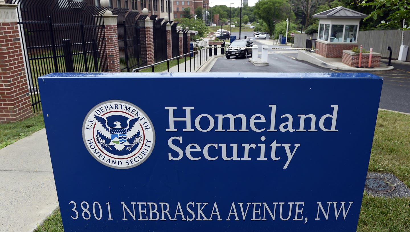 A gate leading to the Homeland Security Department headquarters in northwest Washington, Friday, June 5, 2015. China-based hackers are suspected once again of breaking into U.S. government computer networks, and the entire federal workforce could be at risk this time. The Department of Homeland Security said in a statement that data from the Office of Personnel Management _ the human resources department for the federal government _ and the Interior Department had been compromised. (AP Photo/Sus