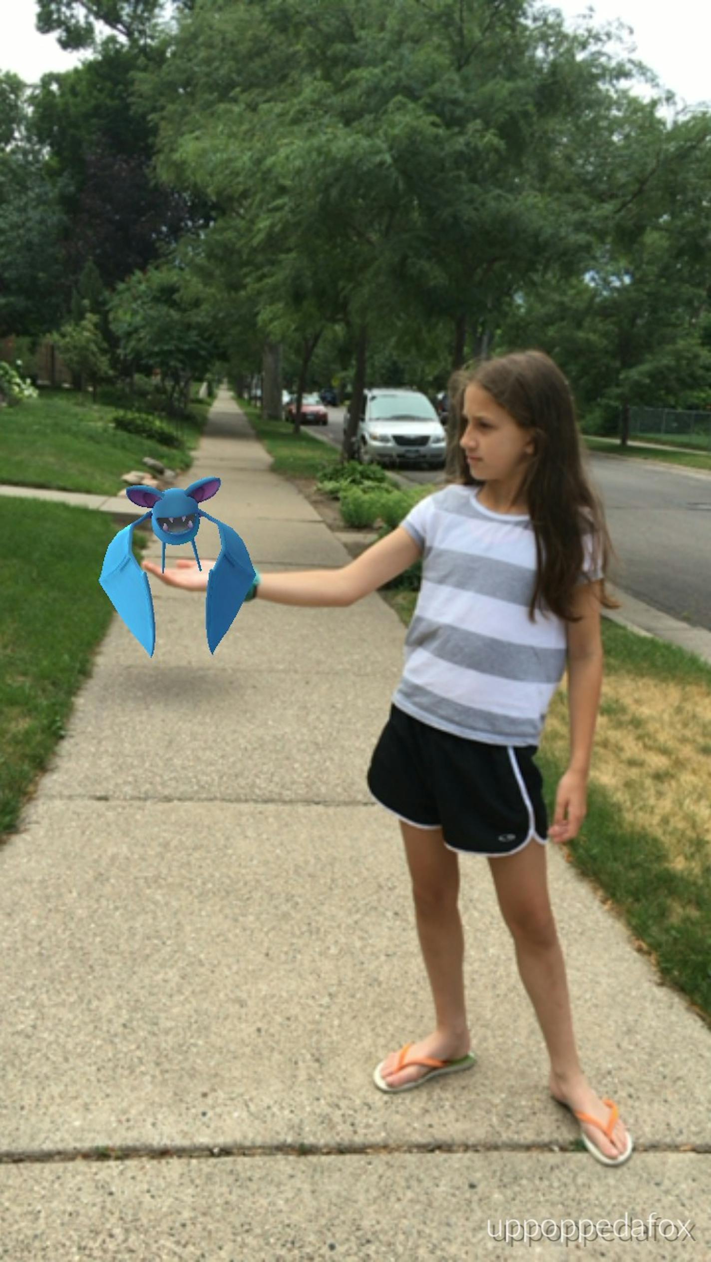 The author snapped this photo of her daughter while they played Pokemon Go.