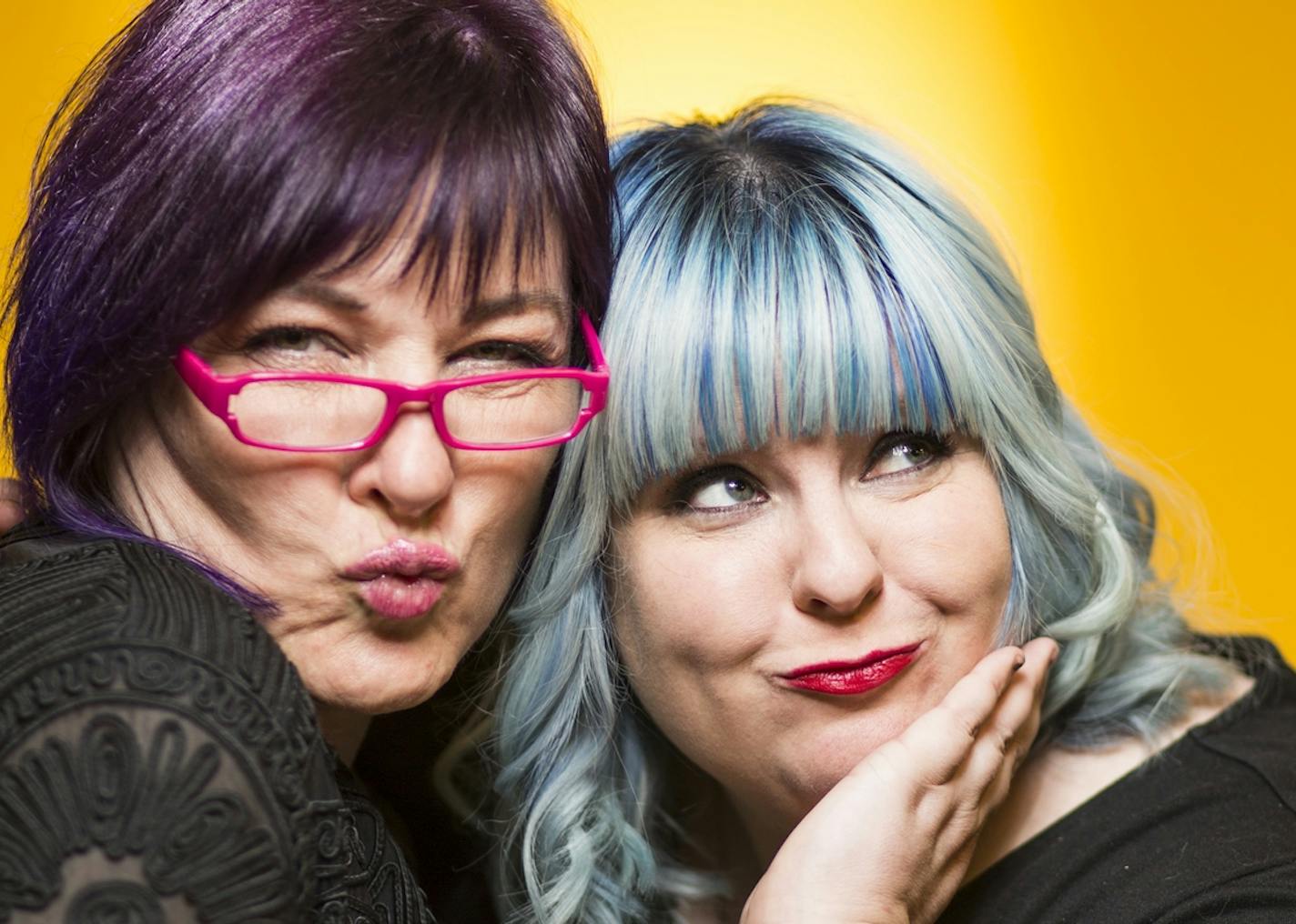 Liz Zilka, left, and Erica Hanna let their tresses reflect their creativity. Hanna said: "My hair can be a calling card, a flag to wave, 'Hey, I'm the creative one.'"