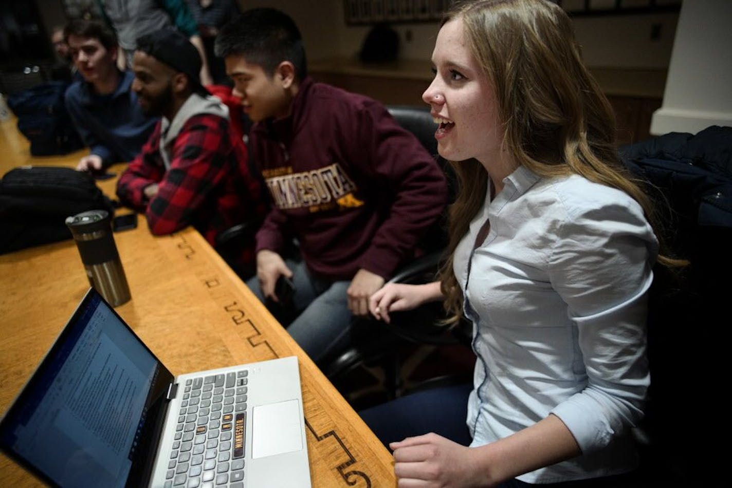 A bipartisan student group including president Symantha Clough, foreground, met at the U. This is bucking the national trend, bringing together students of different political persuasions for polite debates about hot political issues. The Minnesota Bipartisans Issues Group meets once a week .