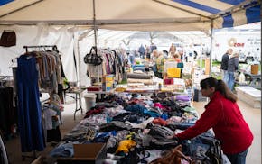 Shoppers browse during the 100 Mile Garage Sale in Lake City.