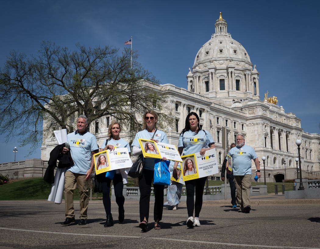 MJ Weiss, second from left, her fiance, Dale Blair, left, and her group Kayla’s Hope spoke with Rep. Mohamud Noor, DFL-Minneapolis, at the capital last month.