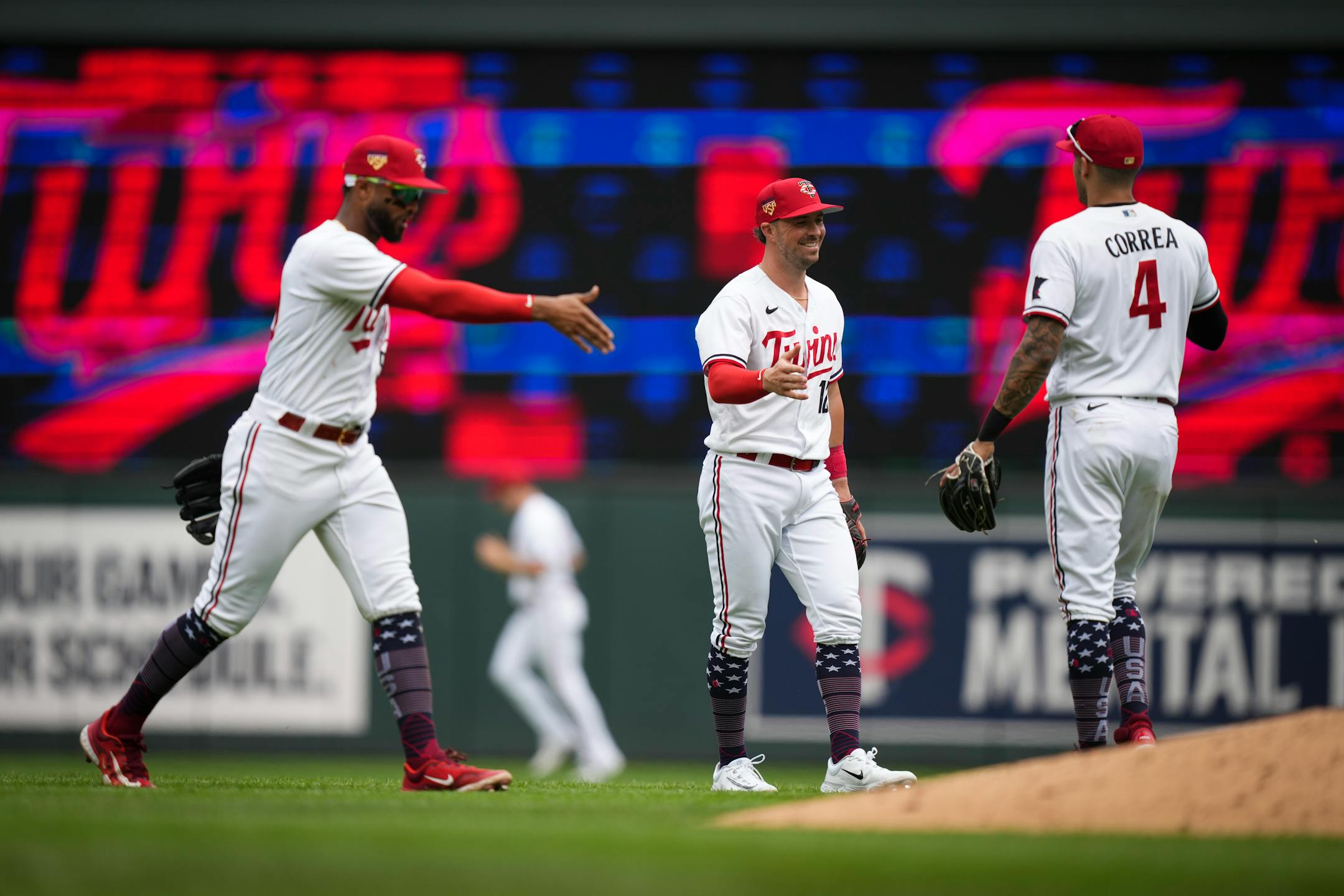 The Twins celebrate their win against Kansas City.