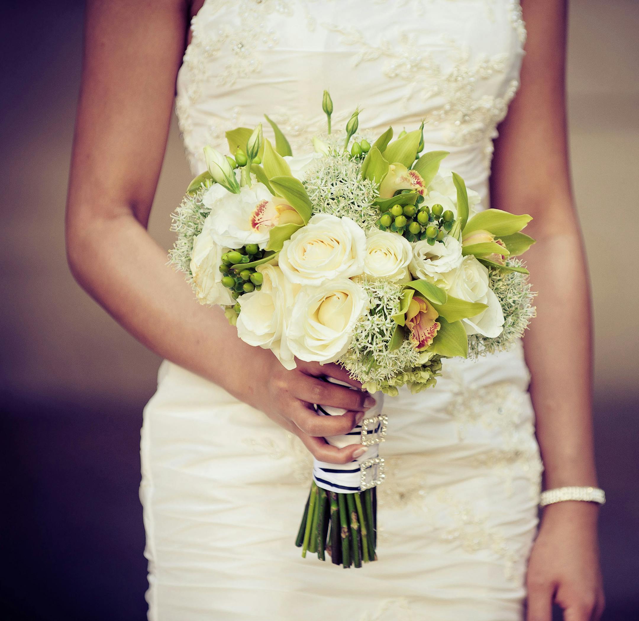 Many brides make the mistake of not seeing the big picture when designing the flowers for their wedding. (Baltazar Photography/Provided by The Knot/MCT) ORG XMIT: 1132995