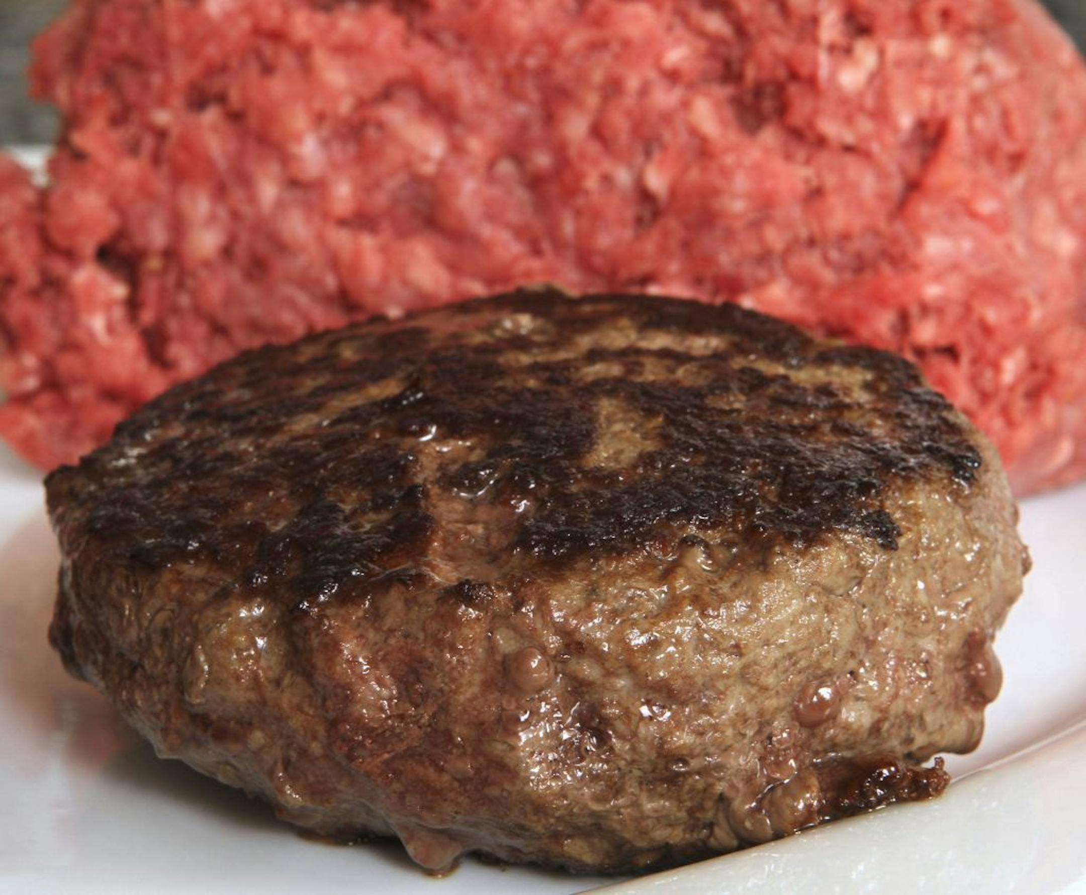 A hamburger made from ground beef containing what is derisively referred to as "pink slime," or what the meat industry calls "lean, finely textured beef," is ready for tasting Thursday, March 15, 2012 in Concord, N.H.