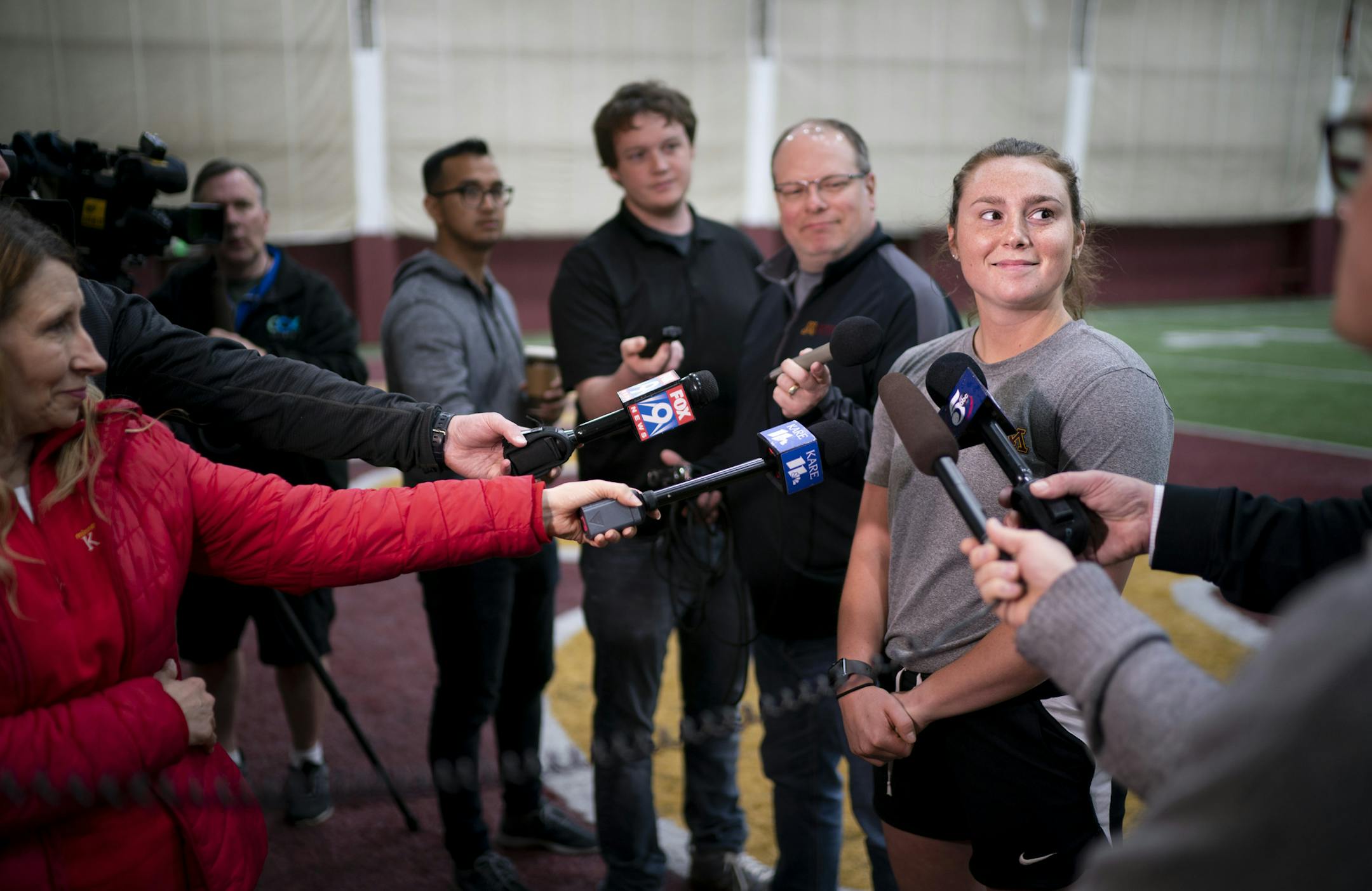 Members of the Gophers softball team, including senior right fielder Maddie Houlihan, met with the media Monday before a Tuesday departure.